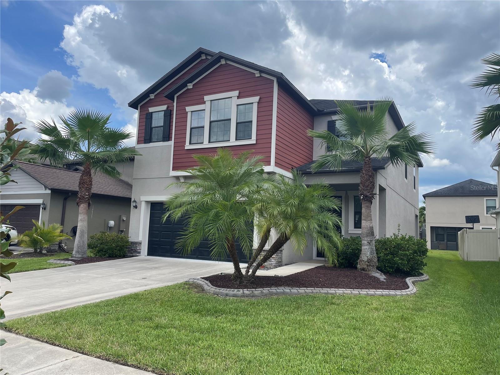 Beautiful 4BR/2.5BA home in sought-after Union Park—move-in ready and packed with upgrades! This home features tile flooring throughout the first floor, an open-concept kitchen with granite counters, stainless steel appliances, 42" espresso cabinets, walk-in pantry, and a large island. The family room includes a cozy electric fireplace. All bedrooms are upstairs, including a spacious owner’s suite with huge walk-in closet, dual vanities, soaking tub, and rainhead shower. Generous-sized secondary bedrooms and a versatile loft provide plenty of room to relax or play. Fresh landscaping, new curbing, and exterior lights add great curb appeal. Located just steps from the playground and dog park. Enjoy Union Park’s walking trails, green spaces, pool, and lounge area. Close to top-rated schools, I-75, hospitals, shopping, and dining.