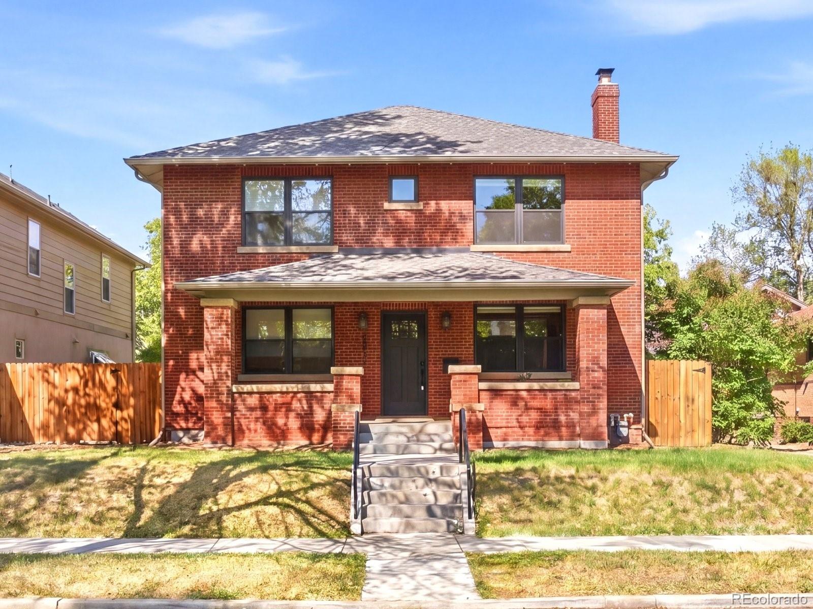 Completed in 2020, this exceptional Park Hill home seamlessly blends timeless Craftsman-inspired architecture with refined modern living in one of Denver’s most sought-after neighborhoods. Thoughtfully designed for both everyday comfort and effortless entertaining, the home offers over 5,000 sqft with 5 beds, 5 baths, and beautifully curated finishes throughout. Natural light pours into the open-concept main level, where hardwood floors, custom Colorado-crafted cabinetry, and extensive built-ins create a warm yet sophisticated atmosphere. The chef’s kitchen features quartz countertops, a walk-in pantry, wet bar, breakfast nook, and abundant storage, all flowing seamlessly into the spacious living room with french doors that open to the backyard retreat. The main level also includes a formal dining room, dedicated office, powder bath, and a mudroom designed for functionality. Upstairs, you’ll find a luxurious primary suite featuring a spa-like 5-piece bath with an oversized shower, plus two walk-in closets. There are two additional bedrooms, each with its own en-suite bathroom, a laundry room, and a versatile loft filled with natural light from the skylights, perfect for a secondary living space or playroom. The finished basement impresses with soaring 9-foot ceilings, a large recreation room perfect for movie nights, beverage bar, bathroom, and two additional bedrooms, one currently configured as a gym. The exterior showcases enduring craftsmanship with a full brick façade accented by sandstone sills and caps. Outside, the private backyard offers a true escape with a large deck beneath a pergola, creating the perfect setting for outdoor entertaining or quiet evenings at home. Additional highlights include an insulated oversized 2-car garage with EV charging capability. Ideally located just a short walk from the shops & restaurants, along 23rd Ave., Kearney St., and Fairfax St., this home perfectly balances luxury, comfort, and convenience in the heart of Park Hill.