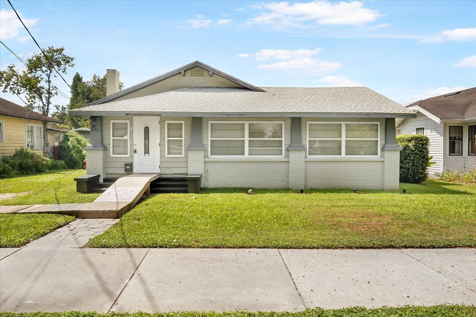 Discover the perfect marriage of timeless charm and modern luxury in this magnificent historic Plant City residence. Nestled within a quiet neighborhood near the local library, this home offers a sense of peaceful community without sacrificing access to amenities. The property boasts extensive recent updates, ensuring turn-key ownership for its next fortunate resident.

Step inside to find a beautifully modernized space, highlighted by brand New flooring throughout the house. The architectural detail of Trey ceilings and the warmth of a Gas Fireplace create an inviting atmosphere in the main living areas. Peace of mind is provided by a major update: an updated 2 year old roof.

The heart of the home, the kitchen, features stunning Granite Countertops and is equipped with a full suite of New kitchen appliances, including the unexpected convenience of an Automatic kitchen sink.

Retreat to the owner’s suite, designed for ultimate comfort with a large master shower for 2 and generous storage in the Large closet in masters. Guest accommodations are equally appointed; the home includes a completely refreshed New guest bathroom, and the guest room features both a spacious Extra large walk-in closet and stylish New barn doors, combining historic style with modern functionality. This beautifully preserved and updated home is a rare opportunity for luxury living in Plant City.