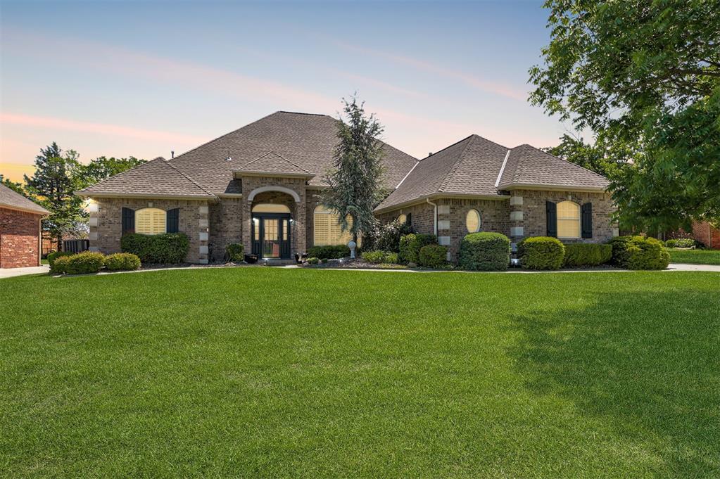 Welcome to timeless elegance in the heart of Olde Edmond, one of Edmond’s most prestigious gated communities. This exceptional single-level estate offers a seamless blend of refined interiors and resort-style outdoor living, creating an unparalleled lifestyle defined by comfort, sophistication, and thoughtful design. Inside, soaring ceilings and expansive windows make a striking first impression, flooding the home with natural light and capturing serene views of the sparkling pool. A formal living room provides an elegant space for entertaining, while the open-concept family room, anchored by a stunning fireplace framed with rich wood paneling, flows effortlessly into the chef’s kitchen and dining areas. Designed for both everyday living and upscale gatherings, the kitchen is a true showpiece featuring premium stainless appliances, double ovens, sleek countertops, abundant cabinetry, and a generous center island with exceptional storage. Multiple dining spaces offer flexibility for intimate dinners or larger celebrations. The primary suite is a tranquil retreat, complete with private patio access and a spa-inspired ensuite bath showcasing a soaking tub, dual vanities with a dedicated dressing area, an oversized walk-in shower, and an expansive closet. Guests will appreciate the privacy of an ensuite bedroom, while two additional secondary bedrooms share a well-appointed bath and offer walk-in closets. A dedicated study provides versatility as a home office, media room, or lounge. Outdoors, the backyard is an entertainer’s dream. A beautiful pool serves as the focal point, surrounded by multiple patios ideal for dining, relaxing, and hosting memorable gatherings. Additional highlights include a brand-new roof (June 2025), plantation shutters throughout, an in-ground storm shelter located in the garage, and award winning Edmond schools. This is luxury living at its finest, welcome home to your forever residence in Olde Edmond.