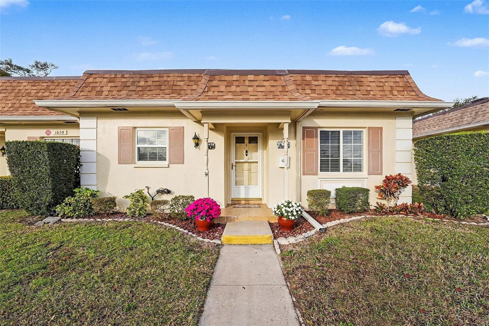 Virtually Staged. Sellers are motivated and ready to make a deal!  This move in ready 2-bedroom, 2-bath villas located in the desirable, 55+ Normandy Park Villa Community.  This sought-after corner unit has been beautifully remodeled all within the last five years.  Offering 1527 square feet of spacious living with modern updates, quality finishes, and total peace of mind.The stylish kitchen was updated between 2020-2023 with new appliances, quartz countertops, custom cabinetry, a tile backsplash, ceramic wood-look flooring and a custom-build breakfast nook. Luxury vinyl plank and ceramic tile flooring run throughout the home - no carpet to maintain. Interior updates include fresh paint, updated lighting and ceiling fans, new bathroom vanities and mirrors, updated electrical outlets, and 6-panel bifold doors.  A custom closet by Design Shelving features a window seat that adds both function and charm.  Enjoy your morning coffee on your private rear patio.The community offers a heated pool and a large clubhouse, a library, card room, an exercise room with a pool table. Fun activates like coffee hour, bunco, bingo, chair volleyball, water aerobics, poker night,  rummage sale yearly, and so much more. Conveniently located just steps from Eagle Lake Community Park, and Le Belle Shopping Plaza with restaurants, salons, a pet store and a UPS store.  Close to area beaches and with easy reach to both St. Petersburg Clearwater International Airport and Tampa Internation Airport.