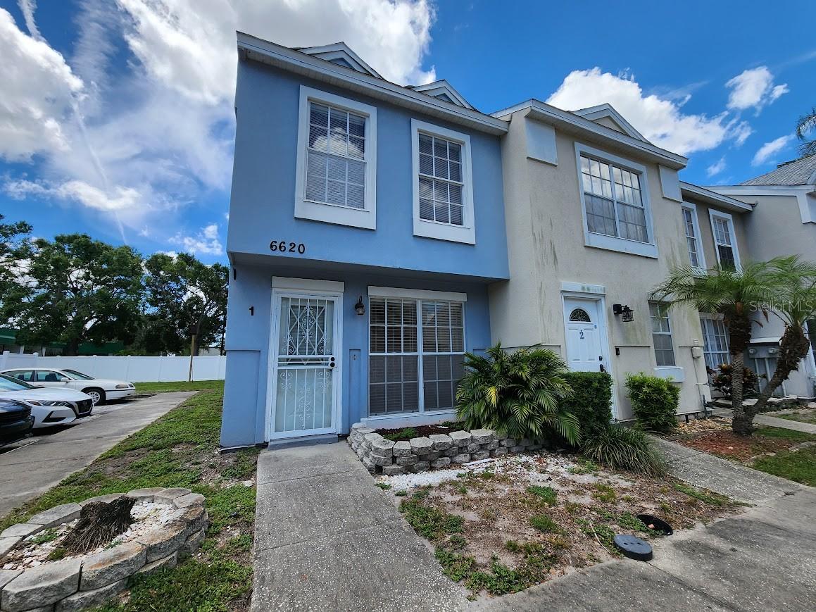 This spacious 2-bedroom, 2.5-bath end unit offers exceptional value and is priced to sell quickly. Ideally located in the centrally positioned Pinebrook Estates, the community features amenities such as a sparkling pool and racquetball courts, all just minutes from I-275 for easy commuting.

The home boasts a thoughtfully designed layout with tile flooring throughout the main level, a convenient half bath, and a large open-concept living and dining area perfect for entertaining. The kitchen features a breakfast bar for casual dining and added seating. A dedicated laundry closet includes a full-size washer and dryer for your convenience.

Upstairs, the primary suite impresses with vaulted ceilings, two closets, and a private en-suite bath. An additional full bathroom—designed with a privacy door—can function as an en-suite for the second bedroom as well. Brand-new carpet adds comfort and style to the upper level, and the roof was replaced in 2018, offering peace of mind.

Pet lovers will appreciate the community’s accommodating pet policy, including allowance for larger breeds. The unit comes with a reserved end parking space directly in front, with no neighboring vehicle, as well as ample guest parking nearb