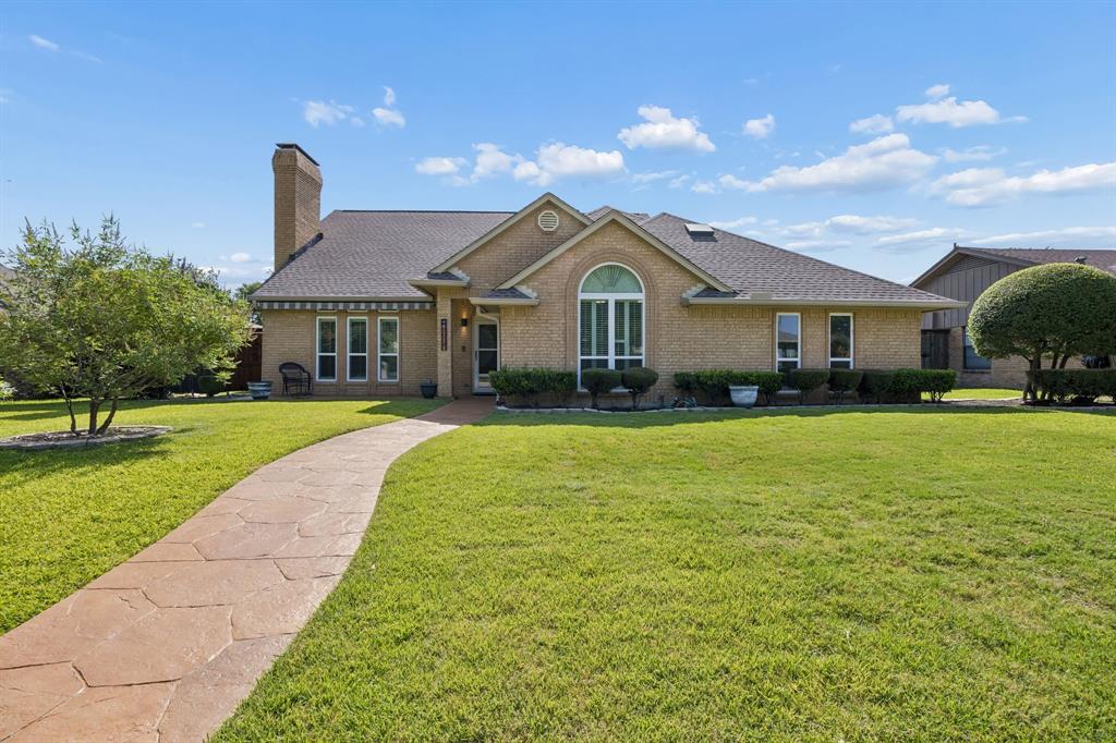Welcome to 2604 Winterplace Circle, a beautifully maintained home tucked away on a quiet cul-de-sac in the heart of Plano. Offering 2,869 sq ft of thoughtfully designed living space, this 4-bedroom, 3-bathroom home combines spacious living, timeless charm, and an exceptional backyard retreat.  Step inside to soaring vaulted ceilings, rich hardwood look tile flooring, abundant natural light, and a striking stone fireplace flanked by custom built-ins. The spacious living room flows effortlessly into a bright sunroom, creating the perfect place to relax, entertain, or enjoy views of the backyard year-round. The kitchen offers generous cabinet storage, double ovens, a gas cooktop, ample counter space, and an adjoining breakfast nook for casual dining, A separate formal dining room provides additional space for hosting family gatherings and special occasions. The thoughtfully designed floor plan features a private first-floor primary suite features a spacious walk-in closet and ensuite bath, along with a secondary bedroom and full bath on the main level, ideal for guests, in-laws, or a dedicated home office. Upstairs you'll find two oversized secondary bedrooms with large closets, one of which could make an exceptional game room, and a shared full bath, providing plenty of room for family or guests. An oversized laundry room offers exceptional storage, workspace, and everyday convenience, an often-overlooked feature that truly enhances the home's functionality.Step outside to your own backyard oasis complete with a sparkling pool and spa, covered patio, and plenty of deck space for relaxing or entertaining. Located within highly sought-after Plano ISD and just minutes from shopping, dining, parks, and major commuter routes, this home offers an outstanding opportunity to enjoy space, comfort, and a prime location in one of Plano's most established neighborhoods.