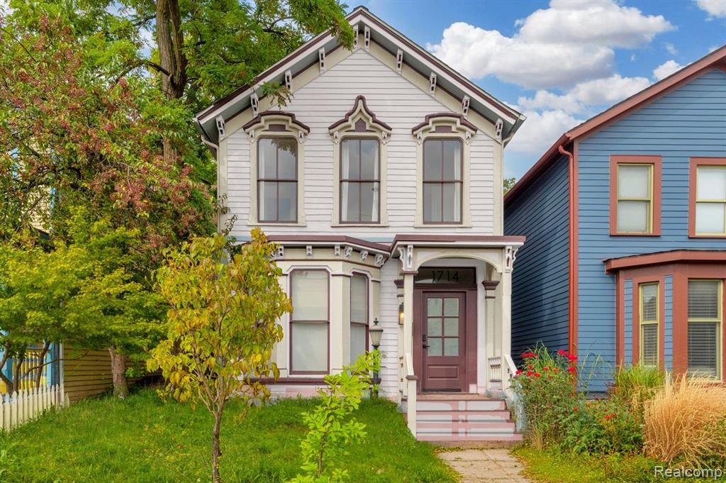 Looking for space, style, and location? This single-family gem checks every box. This exquisite 1880 blush-colored Victorian has been reimagined into a modern masterpiece in Detroit's Historic Corktown neighborhood steps from Michigan Central, Artclvb, Stoned Cold Nails, Folk, Metaphysica Wellness, James Oliver Coffee and so much more!! The interior has soaring ceilings, fresh interior paint, new engineered oak flooring throughout, design forward globe style lighting fixtures, updated electrical and plumbing + reinforced foundation. In the rear of the home, find a stunning kitchen remodel with new stainless steel appliances, a spacious center island anchoring the room - perfect for casual dining, meal prep, or entertaining. The eye catching herringbone patterned flooring adds a sophisticated touch, creating visual interest and elevating the entire space. Just off the kitchen, a windowed door opens to a sprawling wooden deck, nestled beneath the canopy of a mature tree with multiple seating areas perfect for morning coffee, sunset dinners, or weekend gatherings. Convenient first floor laundry and entry level home office that could be converted into the home's 4th bedroom. The second level offers 3 bedrooms and 2 full bathrooms, the primary bedroom having southern facing views, large beautiful windows, and a generous sized bathroom complete with a soaking tub, stand up shower, and double sink vanity. Ample closet space throughout and basement can be used for additional storage. Off-street parking available in the fenced in backyard. Contact us to schedule a private showing and secure a spot in one of Detroit's most desirable and dense neighborhoods, just west of the heart of the bustling and lively downtown area. NEZ-Homestead district.