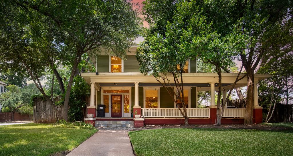 LOVE WHERE YOU LIVE. Dallas history has arrived in Oak Lawn, where historic integrity meets modern living at 3403 Knight St. Built in 1914, this home stands as a quintessential Colonial Revival American Foursquare showcasing classic symmetrical balance. On a prime corner lot, a massive covered porch welcomes you into an oasis defined by 10-ft ceilings, original pine floors & exquisite trim. The grand entry leads to a living room with a brick gas fireplace. Pocket doors divide the floor plan, including a dining room with a glass butler's pantry. The modernized kitchen showcases honed granite counters & a farmhouse sink. Up the cantilevered staircase, the second-floor features 3 oversized bedrooms with storage, oversized bathroom with original double-faucet sink, clawfoot tub, steam shower and a dedicated laundry room. This luxury lock-and-leave home is an ultra-convenient retreat. The grounds boast mature live oaks & pecan trees, secured by a cedar fence with an electric gated driveway. Blending historic charm with an unbeatable walkable location, the home sits steps from Oak Lawn favorites like Eatzi’s Market, Starbucks, La La Land, Gloria’s, Whole Foods & the Katy Trail—offering a 40-minute bike ride to scenic White Rock Lake. Nearby Turtle Creek Village & West Village provide immediate access to upscale boutiques & dining like Enoteca Italia & Snooze Eatery. Connoisseurs will appreciate the 10-minute proximity to galleries in the Dallas Arts District and high fashion at Highland Park Village. Enjoy effortless commutes, sitting 10 minutes to UT Southwestern Medical Center, 10 minutes to Love Field Airport and 20 minutes to DFW Airport making it the ultimate destination for sophisticated Dallas living.
