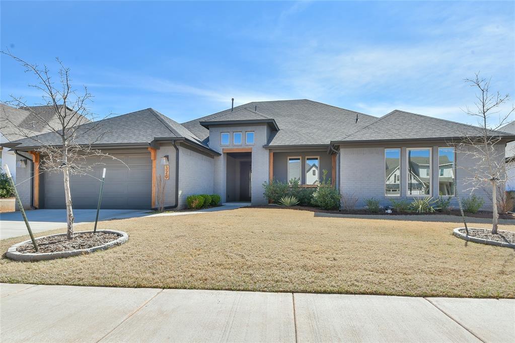 OPEN HOUSE - 04/12, Sunday, 2PM - 4PM***Welcome to 320 Maybury Dr in Norman’s sought-after Little River Trails community, where modern design meets everyday convenience. This stunning 4-bedroom, 3-bath home with 2,444 sq ft, built in 2021, offers the perfect blend of style, comfort, and location.  Step inside to soaring ceilings, rich wood flooring, and a spacious living area centered around a sleek electric fireplace. The gourmet kitchen is a showstopper featuring dazzling white granite countertops, a large center island, floating shelves, a farmhouse sink, and a full backsplash—ideal for entertaining or everyday living. Natural light pours through oversized windows, creating a bright and inviting atmosphere throughout the home.  The primary suite is a private retreat with a spa-inspired bathroom complete with double vanities, a soaking tub framed by a designer accent wall, and an oversized walk-in shower. Three additional bedrooms provide flexible space for guests, family, or a home office. Outside, the backyard is built for relaxation with a covered patio, outdoor fireplace, and hot tub—perfect for Oklahoma evenings.  Located just minutes from University of Oklahoma, this home offers quick access to campus events, dining, and shopping in downtown Norman. Residents of Little River Trails enjoy neighborhood amenities including green space, walking trails, a pool, and a clubhouse, while being only about 5 minutes from I-35 and 10 minutes from OU for an easy commute.  Outdoor lovers will appreciate being a short drive from Lake Thunderbird State Park, known for boating, hiking, fishing, and miles of scenic trails.  If you’re looking for newer construction, upscale finishes, and a prime Norman location near OU and major amenities, this home delivers it all.