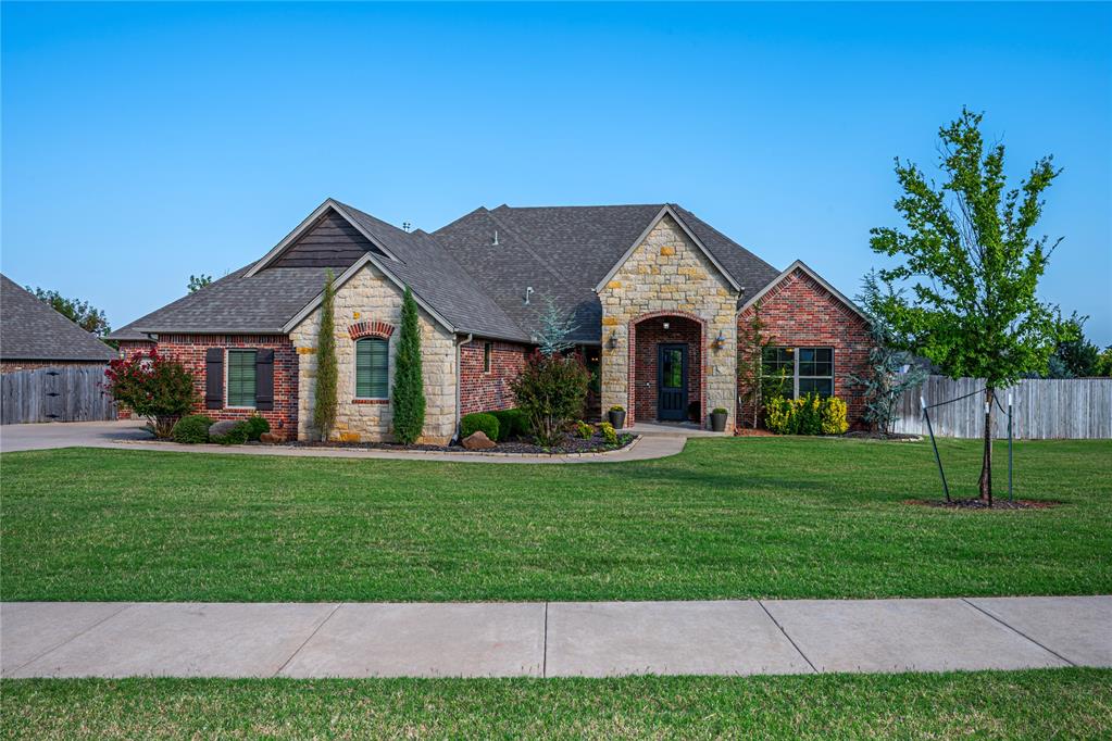 ABSOLUTELY STUNNING! Located on a 1/2 acre lot in the desirable Vizcaya neighborhood in Piedmont schools, 15400 Colonia Bella Dr offers everything you expect in a luxury home & so much more. As soon as you walk through the front door, you’ll be pulled in by the tall ceilings, gorgeous wood floors & big windows that allow for abundant natural light. To your right is the study with a full wall of built-in bookshelves & cabinets plus a storage closet. On your left is the open formal dining room with a custom-built serving hutch w/wine rack & glass front cabinets to display your crystal & china. The heart of this home is truly the open kitchen & living room areas where there is plenty of room to gather. In the kitchen, you’ll love the big island, granite countertops, SS appliance, 5-burner gas stove, custom millwork, large pantry, and the picture perfect breakfast nook! The oversized living room has a fireplace, wood floors & big windows that look into the backyard. Spectacular master suite with brand new carpet, a vaulted tray ceiling & a glass door leading to your private covered back patio, but the bathroom….oh my! With an enormous corner jetted tub, double arched walkthrough shower, double vanities with so much storage and a MASSIVE master closet with built-in dresser that connects directly to the laundry room. Downstairs, there are 2 more secondary bedrooms that share a well-appointed hall bath plus a powder bathroom for your guests! Upstairs is over 500 sqft of flex space that was added after the home was built. With a queen-sized built-in daybed, full bathroom, closet & a built-in counter with sink, storage and a mini-fridge, this space would be perfect for multi-generational living OR whatever you might need it for. All of the “extras” you want—Mud bench in the laundry room, sprinkler system, separate 3rd car pull-through garage with a 2nd overhead door that opens into the backyard, 2 covered back patios. Special homes like this do not come available often.