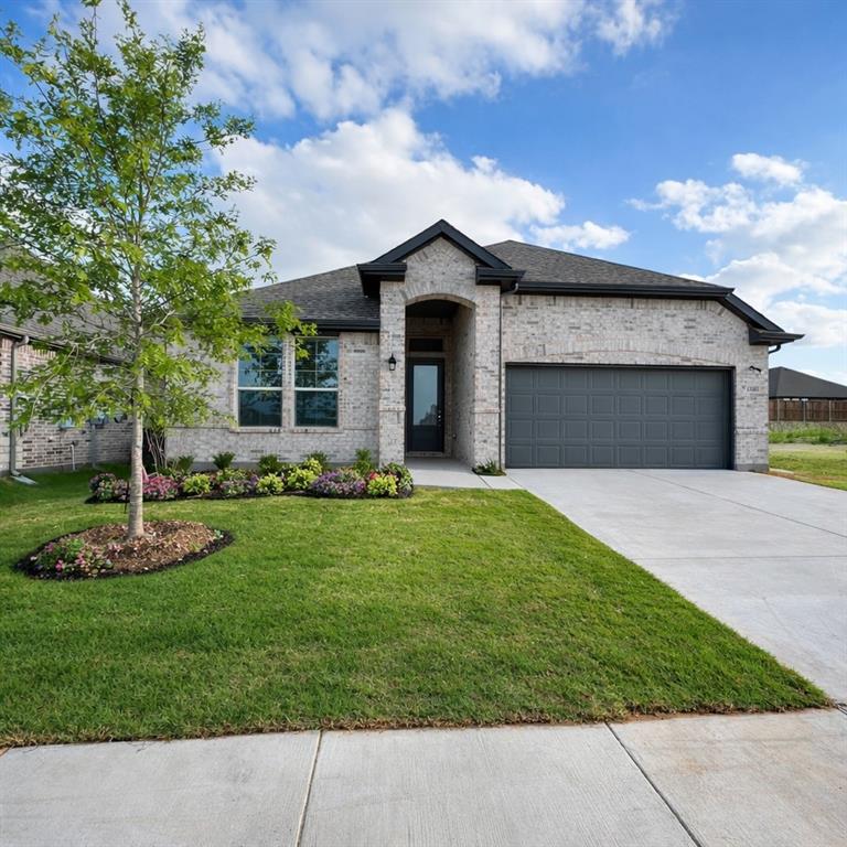 ***FREE LENDER PAID TEMP 2-1 BUYDOWN! ASK ABOUT OUR ADDITIONAL LENDER INCENTIVES, contact agent for details, including potential NO down payment options, closing cost assistance, etc.*** Like-new and impeccably maintained, this beautiful single-story 4-bedroom, 2-bath home with a 2-car garage offers modern style, comfort, and functionality in the heart of Justin. Designed with today’s lifestyle in mind, the open-concept floor plan creates an effortless connection between the living, dining, and kitchen spaces, ideal for both everyday living and entertaining. The spacious living area is filled with natural light and provides a welcoming atmosphere for relaxing nights at home or hosting friends and family. At the center of the home, the kitchen truly shines with sleek white shaker cabinetry, stainless steel appliances, and an oversized island that serves as both a prep space and a gathering hub. Whether you’re cooking, entertaining, or enjoying casual meals, this kitchen makes it easy to stay connected. The private primary suite offers a serene retreat, featuring plush carpeting and a spa-inspired en-suite bath designed for relaxation. Generously sized secondary bedrooms provide flexible options for guests, a home office, or additional living space, each with ample closet storage and convenient access to a modern full bathroom. Step outside to the covered back patio, perfect for morning coffee or unwinding in the evenings, all while enjoying a low-maintenance outdoor space. This home also includes smart home features, adding convenience and efficiency to everyday living. Move-in ready and thoughtfully designed, this contemporary home combines comfort, style, and practicality, making it a standout opportunity you won’t want to miss!