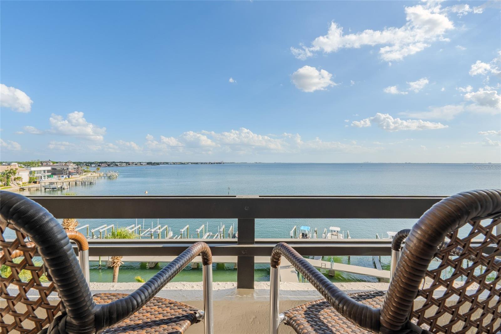 South Tampa/Beach Park open bay condo. Everyday is Saturday on this 5th-floor condo offering a rare combination of affordability, comfort, and a million dollar view, all in the heart of South Tampa’s highly sought-after Beach Park area! The layout is open and functional, with natural light pouring in from the south-facing exposure and drawing your attention straight out to Old Tampa Bay. The living space flows easily onto an oversized balcony—perfect for relaxing, entertaining, or just enjoying the bay breezes. Inside, the unit features a clean, modern feel and a low-maintenance design that makes everyday living easy. The spacious bedroom includes its own full bath and balcony. An additional half bath for guests, also includes its own washer and dryer. Located in the prestigious Plant School District and just minutes from Westshore. This condominium offers unbeatable convenience to Tampa International Airport, Bayshore Beautiful, Hyde Park shopping, dining, and world class beaches. The affordable HOA fee of $727, also covers your water, grounds maintenance and insurance! Whether you're looking for a primary residence, a seasonal escape, investment opportunity or a low-key waterfront lifestyle, this unit checks all the boxes. Watch the dolphins and manatees play from your own balcony! This community offers waterfront amenities including a pool, fitness center, and a boat dock—bringing easy, coastal living right to your doorstep!