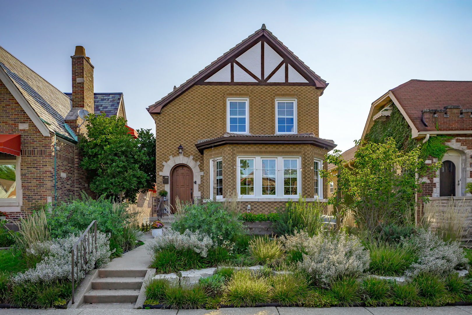 Don't miss your opportunity to own this beautifully updated 3-bedroom, 2.1-bath home on one of Galewood's premier blocks. From the inviting front brick paver patio to the charm of arched doorways, custom built-ins, crown molding,  hardwood floors & abundant natural light, this home blends character with modern updates. The open kitchen features stainless steel appliances, a breakfast bar, and flows seamlessly to the dining and living areas-ideal for entertaining. A versatile main-level bonus room with adjacent updated full bath (2024) offers flexibility for office, playroom, or guest space. Upstairs, find three spacious bedrooms with large closets, full bath, and laundry. The newly finished basement (2021) provides a family room, workout area, office, storage, half bath, and direct exterior access to the mudroom. Enjoy a low-maintenance, fully fenced yard with new pet turf and new 2-car garage (2024). Major updates include boiler and hot water heater (2024), electric panel (2022), roof with concrete tiles (2017), SpacePak central AC (2016) and security system (2024). Conveniently located near public transit, highways, and the Oak Park / River Forest / Elmwood Park corridor.