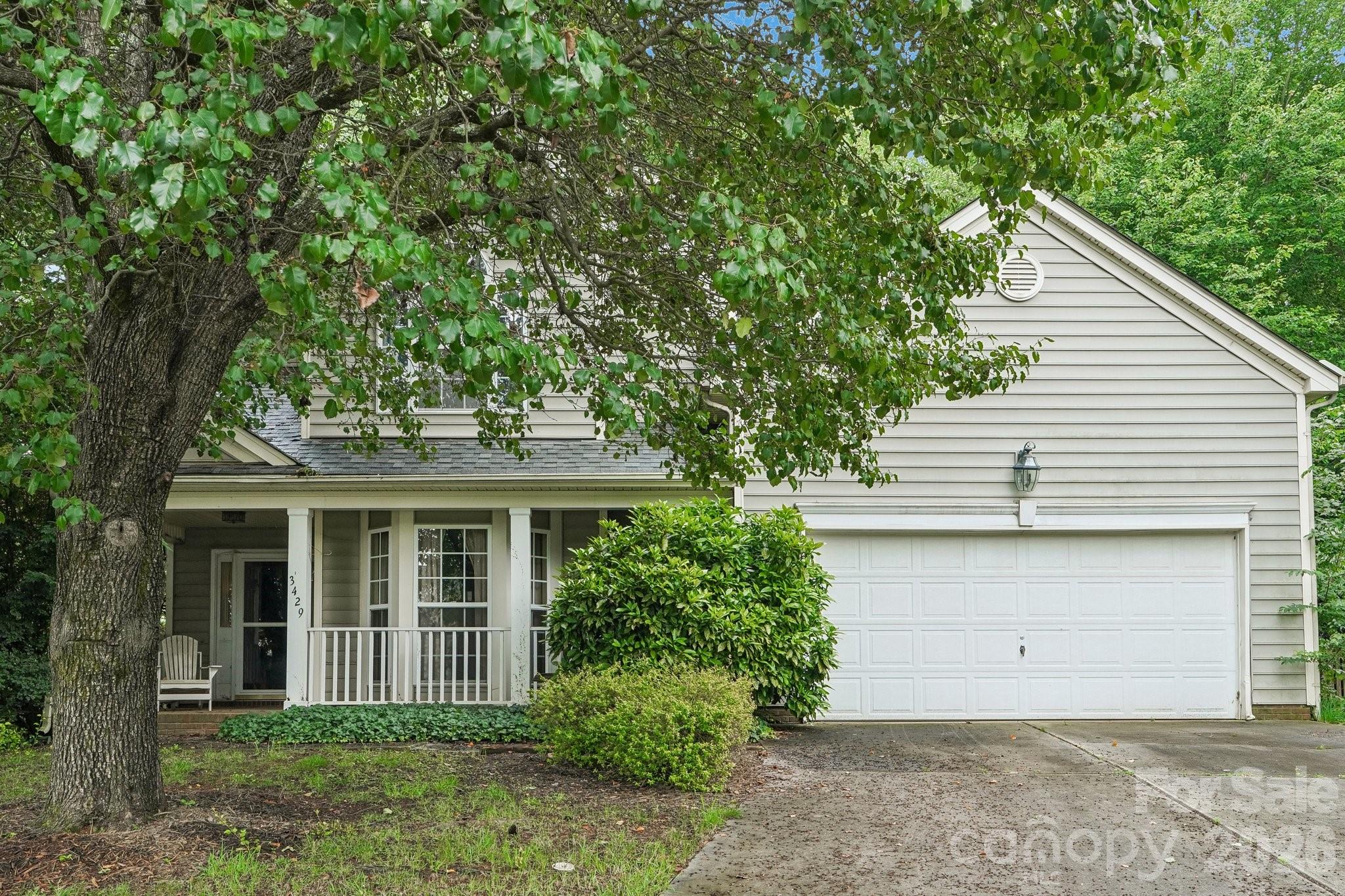 This charming two-story home offers 4 spacious bedrooms and 2.5 bathrooms, thoughtfully designed for comfortable living and entertaining. The main level features a welcoming living room with a cozy gas log fireplace, perfect for relaxing evenings at home. A convenient half bath is located on the first floor for guests.Enjoy gatherings in the separate dining room, or savor casual meals in the bright eat-in kitchen with a cozy breakfast nook. The kitchen is equipped with a gas range and a pantry, providing both functionality and ample storage.Upstairs, all four bedrooms are privately situated, including a generous primary suite and two full bathrooms to accommodate family and guests.Outdoor living is just as inviting with a covered front porch, a rear deck ideal for entertaining, and a fully fenced backyard offering space for play, pets, or gardening. This home blends comfort, convenience, and classic appeal—ready for you to make it your own.