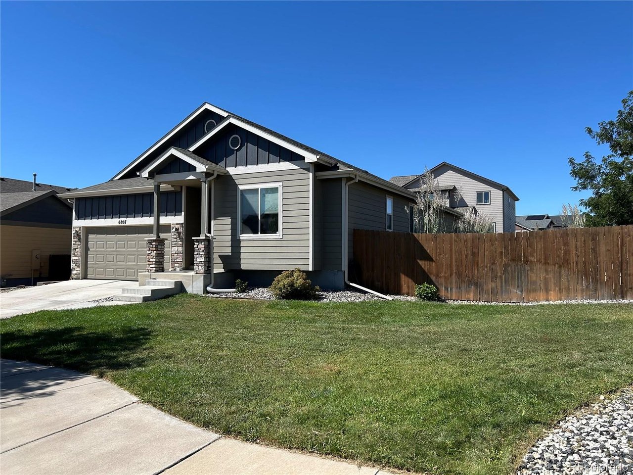 Beautiful Updated Ranch-Style Home in Carriage Hills! This spacious 6-bedroom, 3-bath home offers an open floor plan, abundant natural light, and flexible living spaces ideal for multi-generational living. The main level features newly extended laminate flooring and a bright, welcoming layout. The large kitchen offers granite countertops, a center island, ample cabinetry, and plenty of room for everyday meals and entertaining. A dedicated dining area provides space for a full-size table, while the generously sized family room is perfect for gatherings. Retreat to the spacious primary suite featuring a five-piece bath. The finished basement expands the living space with three additional bedrooms and a large family/entertainment room, providing plenty of options for guests, recreation, a home office, or extended family. The basement is also plumbed for an additional laundry area and bathroom, offering even more future flexibility. Situated on a large corner lot directly across from open space, this home offers exceptional outdoor living. Low-maintenance artificial turf helps reduce water usage and upkeep, while the expansive backyard patio is perfect for relaxing or entertaining on warm summer evenings. The generous side yard provides additional space for RV, trailer, or recreational vehicle parking. Best of all, there is NO HOA! Enjoy convenient access to the recreation center, parks, and schools-all within walking distance. A wonderful combination of space, updates, location, and flexibility makes this Carriage Hills home a must-see! Professional photos coming soon!