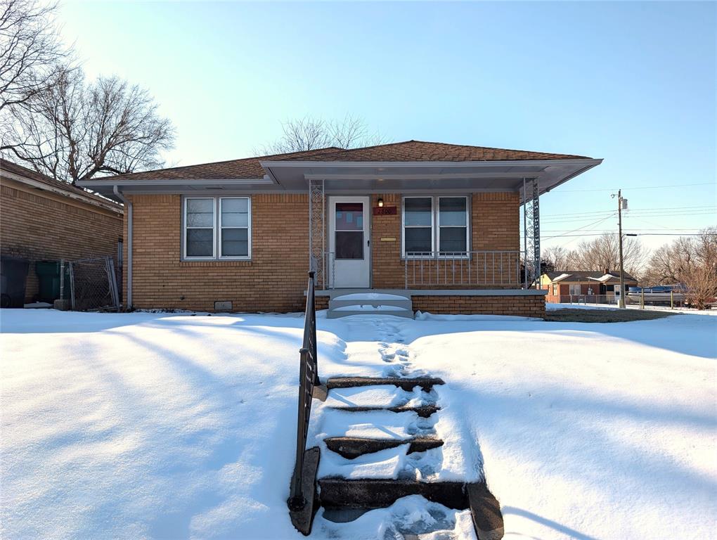 Come see this charming 2-bedroom, 1-bath home filled with abundant natural light! Original hardwood floors add warmth and character, while the centrally located fireplace creates a cozy focal point in the living space. There’s plenty of room to relax and make yourself at home.The kitchen features crisp white cabinetry, a gas stove, and a refrigerator, and flows into a dedicated dining area, perfect for hosting. There's also built-in shelving for extra style and storage. Both bedrooms are nicely sized and share a conveniently located hall bath. Outside, you’ll appreciate the two-car garage and fenced backyard, all situated on a spacious corner lot. Homes like this don’t come around often. Schedule your showing today!