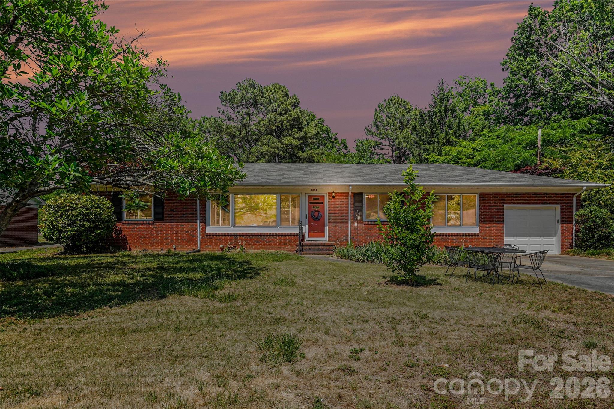 Welcome to Glenbrook Acres! This classic, solid built brick ranch home sits on over half an acre! Lovingly cared for by the same family for 50 years, this home is ready for its new owners. Many great features include gorgeous hardwood floors, a large open kitchen for entertaining, multiple cozy sitting rooms, two spacious bedrooms and two full bathrooms. Don't miss the deck out back, perfect for hosting friends and family. With major updates including a new electrical panel, wiring, and plumbing throughout, this home just needs your personal touch. This neighborhood is one of Charlotte's hidden gems -- come find out why and schedule your tour today!