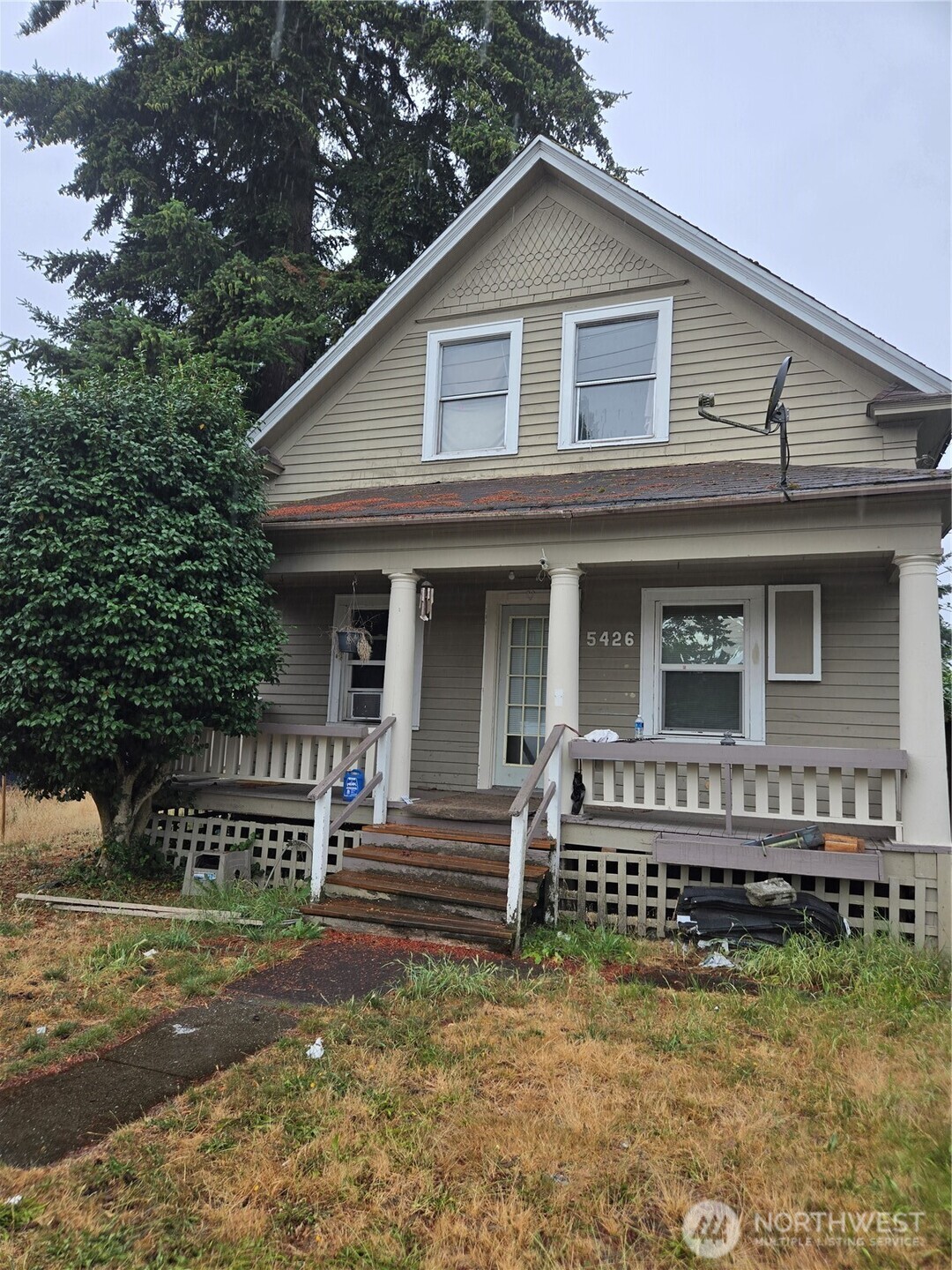 FANTASTIC INVESTOR OPPORTUNITY. Bring your tools and ideas to reconstruct this craftsman home to its original glory or better. Large covered front porch, nice layout, huge upstairs area with lots of possibilities. Some newer windows. BONUS OPPORTUNITY: Good sized lot has a separate, rear/alley HUGE detached 2 car garage w/ a shop, a LOT of extra storage space plus potential above to create a large living quarters/ADU|DADU. Perfect for guest house or additional rental income. Great Tacoma location with easy access to shopping, restaurants, schools, parks, freeways, rec center, bus lines and more. A little sweat equity here will bring solid returns. Buyers to verify with City of Tacoma Planning & Development Services for all/additional development opportunities including duplex, triplex etc. Bring your vision and unlock the full potential of this well-located property in growth area. Cash purchase only. Fixer with good bones and loads of outstanding potential. Property and grounds may only be entered onto by appointment and with accompany of a licensed real estate broker.