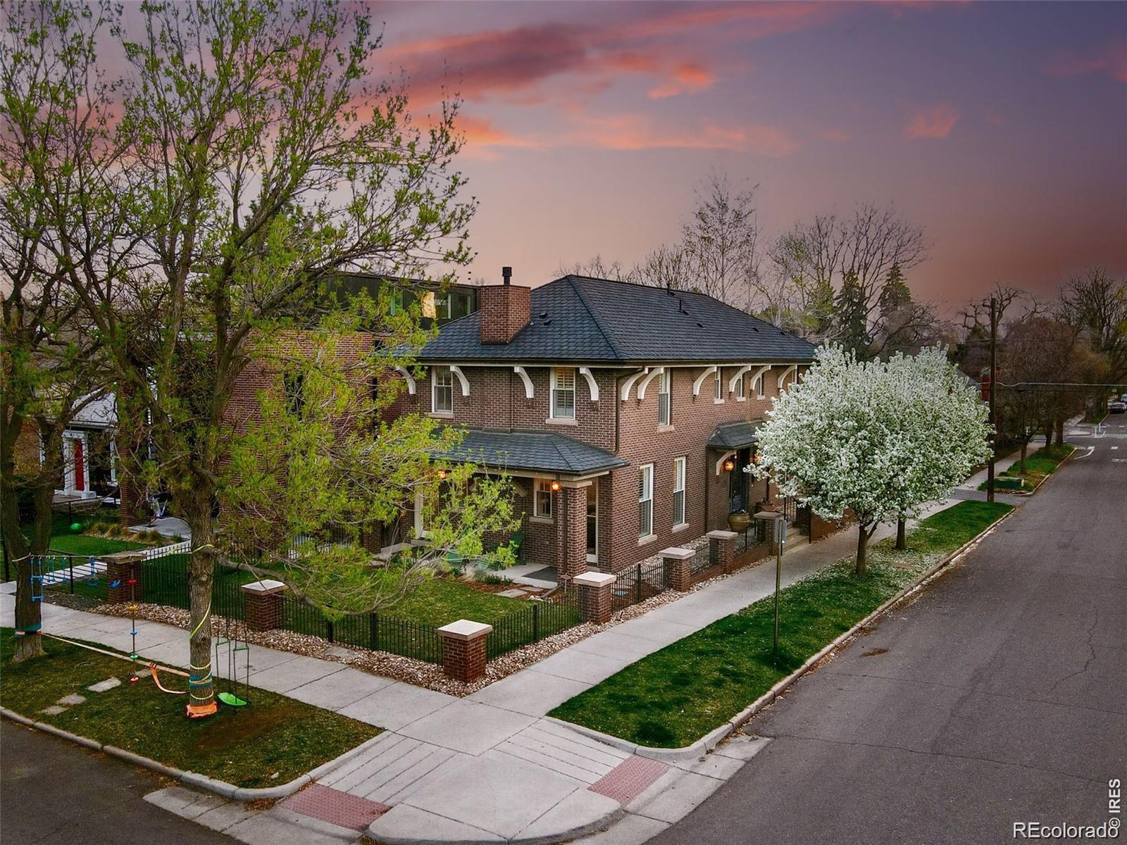 Nestled on one of the most desirable blocks in Washington Park/Country Club South, this custom 2007 residence by Chalet blends timeless architecture with exceptional quality. Meticulously crafted with all-brick masonry and refined finishes throughout, the home welcomes you with sun-filled interiors, rich hardwood floors, and an effortlessly elegant flow from the dining area to the living room. The gourmet kitchen is a true highlight, featuring custom cabinetry, granite countertops, a Waterworks tile package, and top-of-the-line Viking appliances-perfect for both everyday living and entertaining. Upstairs, the spacious primary suite offers a serene retreat, complete with a luxurious five-piece bath featuring a clawfoot tub, marble countertops, floors, and shower, as well as a stunning walk-in closet. Two oversized bedrooms, a second bathroom, and a conveniently located washer and dryer make the upper level both stylish and functional. The fully finished basement is a rare bonus, offering two additional bedrooms, two bathrooms, and a flexible open layout ideal for relaxing or hosting guests. Exterior features include full brick masonry, detailed carpentry, copper gutters, and professionally designed landscaping with a built-in sprinkler system-elevating the home's timeless elegance and curb appeal. Reach out to Andrew for a showing - 303-981-6723 (tel:303-981-6723)