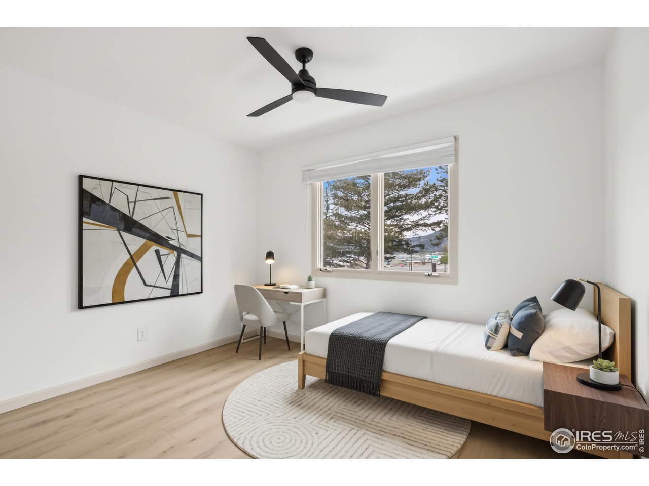 Kittle Real Estate presents a home right where mountain adventure meets everyday comfort! Set in the scenic gateway to the Rocky Mountain National Park, this townhouse-style condo puts you in the middle of everything that makes Estes Park unforgettable. Move-in ready with fresh interior paint and updated LVP flooring throughout, this 2-bed, 1-bath unit welcomes you with an open living area that is easy to maintain. The adjacent kitchen features modern white appliances, generous prep space, and ample storage for all your cooking needs. An attached extended 1-car garage provides secure parking plus extra room for gear, storage, or weekend adventure equipment, an especially valuable perk in a mountain setting. The HOA handles most outdoor maintenance, so you have more time to relax or explore. Plus, with short-term rentals permitted, you can earn passive income and enjoy ultimate flexibility. Just minutes from downtown Estes Park, Lake Estes, and beloved local hotspots, enjoy instant access to stunning views, fresh alpine air, and the laid-back mountain-town energy that draws people back again and again.