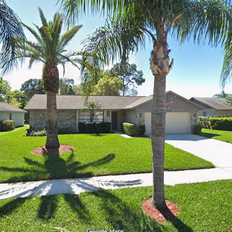 Pond front 3 bed/2 bath home with pool in great Tarpon Springs location!