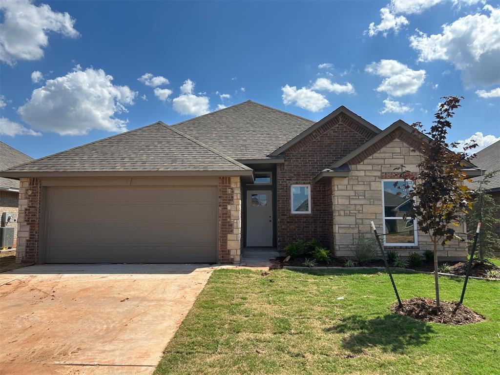 Wonderful, open layout loaded with many features! You will love the attention to detail in this home. Quality wood tile runs throughout the main areas. The kitchen comes with a large island, farm sink, thick quartz tops, under cabinet lighting, custom cabinets, decorative vented hood, stainless steel Samsung built-in appliances and more! Beautiful wood and stone fireplace. The primary bedroom is very large and primary en suite includes a raised vanity with two sinks, spacious tiled shower, garden tub and huge closet. Covered back patio. Very energy efficient home with tankless hot water heater. This home backs up to an HOA maintained common area, providing extra space and privacy. Neighborhood amenities include a large playground, pool, clubhouse with fitness center and gathering hall!