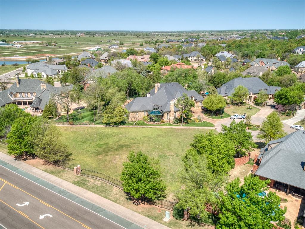 Build your dream home on this beautiful cul-de-sac lot in West Norman's most prestigious neighborhood, Ashton Grove!  Situated on nearly an acre, this is one of the bigger lots you'll find.  Ashton Gove features several ponds, western views, gated entry, and mature trees, and is located in the sought after Roosevelt/Whittier/North school district.