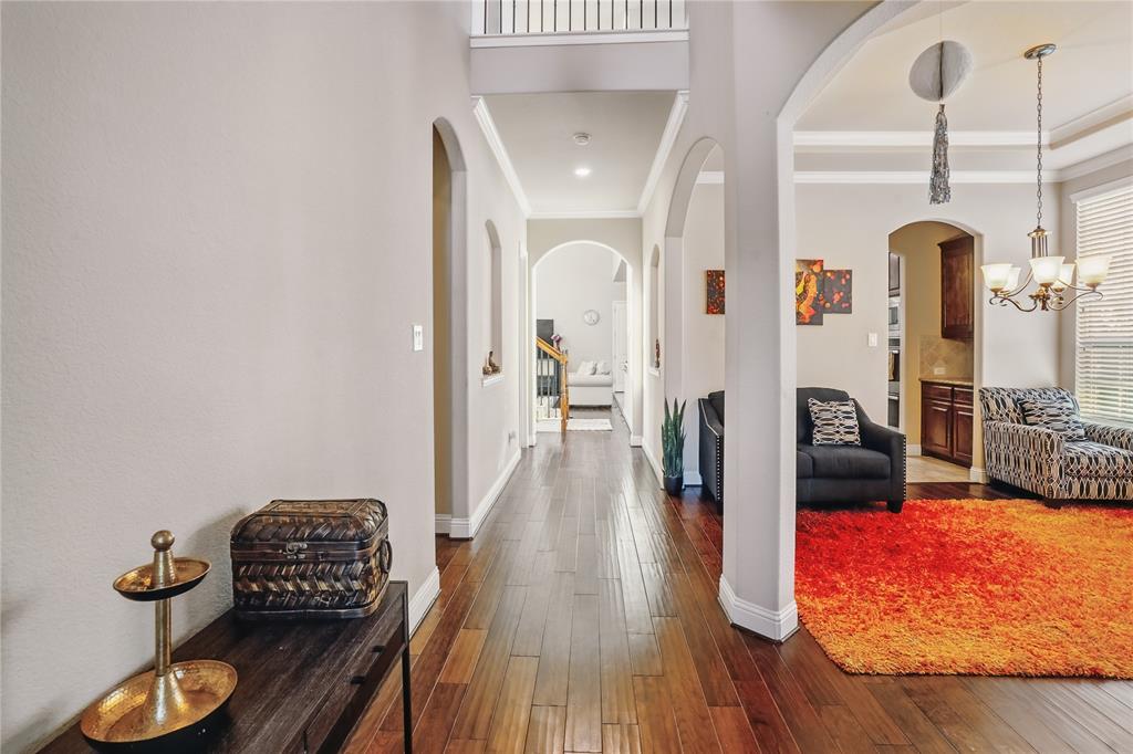 Built in 2016 by Lennar Homes, this Gorgeous corner lot with 4 bed 4.5 bath, 2 story home with high ceiling boasts sleek modern finishes and an abundance of natural light that dances through the generous windows. It has primary bedroom located upstairs, 2nd Primary bedroom in first floor with its own ensuite bathroom and closet, office or study room in first floor, second living space upstairs that can be great for a game room, gourmet kitchen with pleasing granite countertops amazing 42 inch cabinets and modern appliances, covered porch, covered patio and spacious backyard to entertain your pets or guests and enjoy a great time outside. It has stainless GE GAS Appliances, crown molding; tankless water heater; rounded corners; 16 SEER HVAC; radiant barrier; wood framed mirror & soaker garden tub in master bath; programmable thermostat, Hardwoods in entry, halls, dining, study & family. Located in highly south HEB ISD, elementary school is only 0.6 miles away, middle school is 1.3 miles away and high school is 1.7 miles away. Nestled in a vibrant community and peaceful neighborhood just outside the dfw airport,  this  is your gateway to a dynamic lifestyle and experience of city living at its finest complete with trendy eateries, parks, schools, airport and hotspots nearby.Recent Upgrades include 8 Sprinkler heads replaced 04-2025, 4 faucets replaced 04-2025