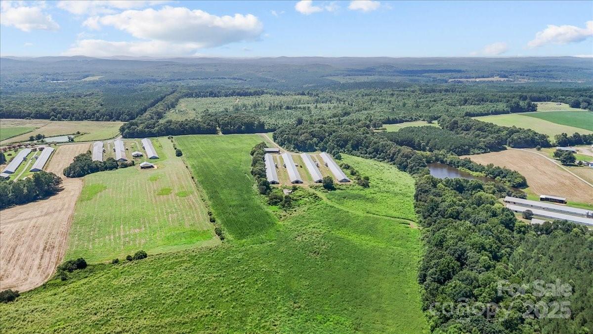 This is a great opportunity to own a fully operational poultry farm situated on 50.06 acres of prime agricultural land, currently planted in corn. The property features four 500-foot broiler houses, a litter shed, and plenty of space for farming or future expansion.



The farm is under an active contract with a reputable poultry company, offering a path to steady income. Some updates will be required by the poultry company to meet current specifications, providing the new owner the chance to modernize and potentially increase long-term value and production efficiency.



Whether you’re a seasoned grower or looking to get started in poultry farming, this property combines infrastructure, land, and opportunity in one package