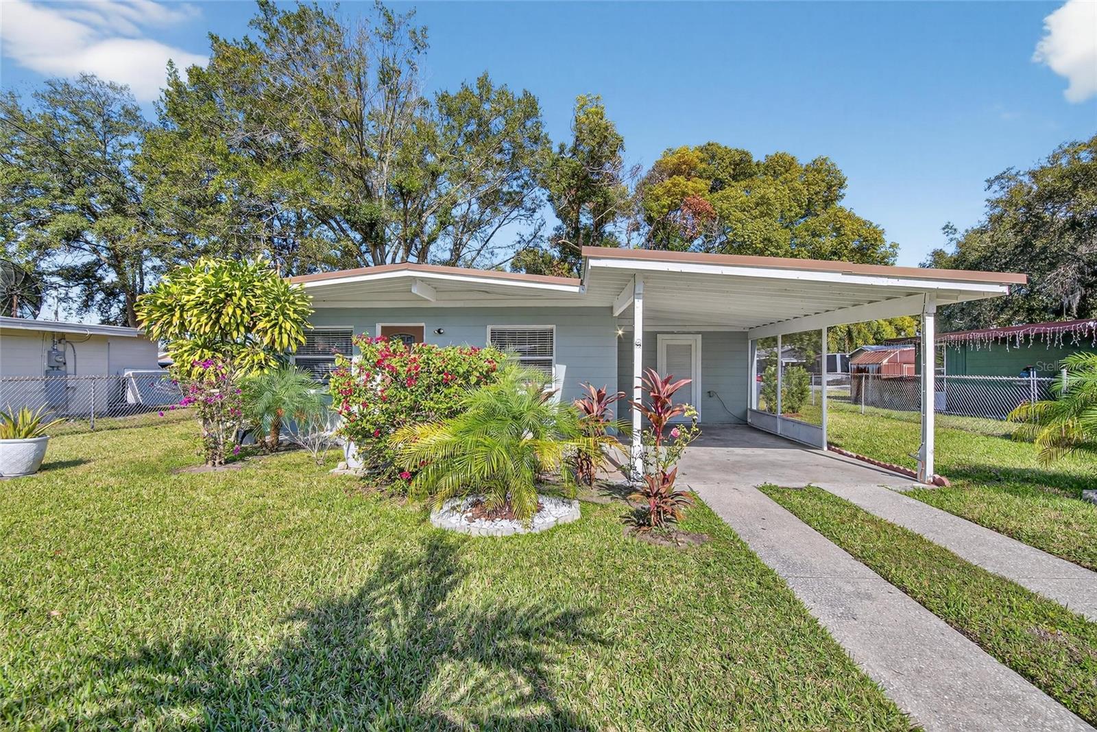 Welcome to your dream home in the heart of Plant City, Florida! This charming residence boasts 1,200 sq. ft. of beautifully renovated living space, complete with 3 bedrooms and 2 bathrooms—perfect for first-time homebuyers or those looking to expand their rental portfolio.Step inside to discover an inviting open floor plan featuring brand new stainless steel appliances, including an apron refrigerator, microwave, range, and dishwasher—all complemented by sleek white cabinets and stunning stone countertops, including a convenient kitchen island. Enjoy the fresh, airy feel throughout, thanks to abundant natural light and new ceiling fans.The home also includes central heat and air, a stackable washer and dryer, and thoughtful touches like blinds over the windows. Outside, you'll find a lovely corner lot with a shared easement, landscaped yard, and fruit trees, providing ample outdoor space for relaxation or entertaining. The property is partially fenced, offering privacy and security.With all major systems—including the roof, electrical, plumbing, and water heater—newly updated, this home is move-in ready. And the best part? It's not part of an HOA and is eligible for Homestead exemption!Located just minutes from the world-famous Plant City Strawberry Festival and close to downtown restaurants and interstate access, this home is perfectly situated to enjoy all that Plant City has to offer. Don’t miss out—schedule your showing today!