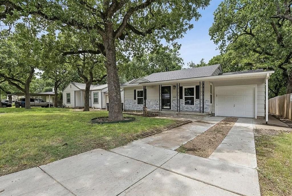Welcome to your fully remodeled oasis! This stunning 3-bedroom, 3-bathroom home has been meticulously updated from top to bottom. Step inside and discover a fresh, modern interior featuring new flooring, paint, cabinetry, light fixtures, and beautifully tiled showers. Every detail has been thoughtfully considered to create a bright and inviting living space.

But the upgrades don't stop there. The spacious backyard hosts a fantastic guest house (additional 660 sqft), perfect for in-laws, a home office, or extra rental income. The guest house includes its own new AC unit, light fixtures, flooring, a full bathroom, a closet, and a convenient kitchenette.

Commuting is a breeze with quick access to Highway 820. Located within the sought-after Fort Worth ISD school district, this home offers both comfort and convenience. Don't miss your chance to own this exceptional property!

TENANT OCCUPIED - Main house on Lease till 6-30-2026 at $2,200mo - Guest House on Lease till 8-31-2026 at $875mo