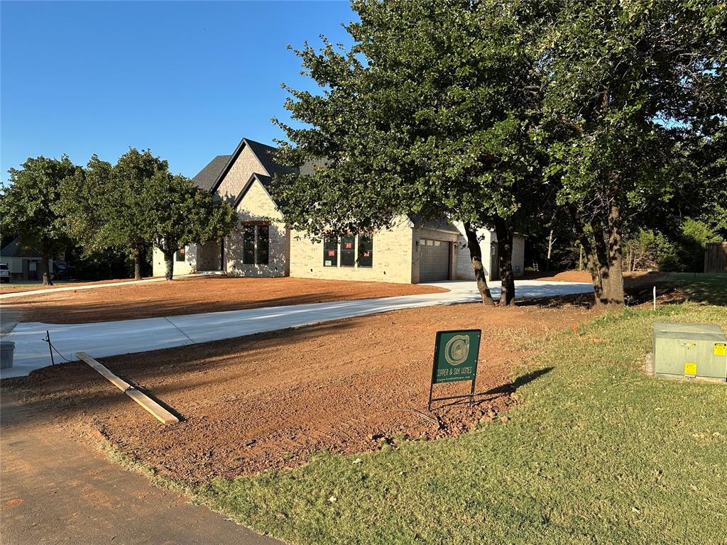 Custom Home situated on 1.33 acres in Gated Edmond neighborhood, this 4 bedroom, 4-1/2 bath home has a dedicated study, game room, and loft. Oversized garage with in-ground storm shelter, commercial appliances in kitchen and upgraded essentials. Boxed or cathedral ceilings in every room, real oak hardwood floors throughout. House is under construction , move in before the holidays. Schedule your tour today!