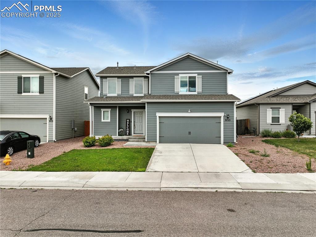Nestled in the inviting southeast community of Carriage Meadows North at Lorson Ranch, this delightful 2-story home offers 3BRs, 2.5BAs, & over 1,800 sf of beautifully crafted living space, designed to enrich your everyday life. A welcoming covered front porch is ideal for sipping morning coffee or enjoying a peaceful evening breeze. The low-maintenance landscaping provides beautiful curb appeal without the hassle. Inside, you'll discover central air & heat for year round comfort. Bright & flowing floor plan, beginning with a warm wood laminate entry & convenient coat closet. The living rm, bathed in natural light from the large view window, features neutral carpet & a stylish lighted ceiling fan, creating an inviting space for gatherings & relaxation. The open-concept design carries you seamlessly into the dining room, where wood laminate floors lead to a sliding glass door that opens to a fully fenced backyard. Adjacent is a well appointed kitchen that boasts rich espresso cabinetry, granite countertops, & black appliances incl a gas range oven, built-in microwave, dishwasher, & refrigerator. Convenient powder bathroom. Upstairs, serenity awaits in the spacious primary suite, complete with a generous walk-in closet & a 5-piece bath featuring a dual sink granite vanity, a soaking tub, & a separate enclosed shower. 2 addtl BRs with neutral tones provide space for family or guests & share a stylish full bath with modern finishes. A convenient laundry room with wood laminate floors & built-in storage rounds out the upper level. The fully fenced yard offers privacy as it backs to open space, perfect for quiet mornings & weekend BBQs. With a 2-car attached garage, this home offers the storage & convenience every lifestyle demands. Located close to schools, parks, Big Johnson Reservoir, & Fountain shopping, & offering a quick commute to Fort Carson & Peterson AFB. Come experience the warmth of this delightful home, where the next chapter of your story begins.