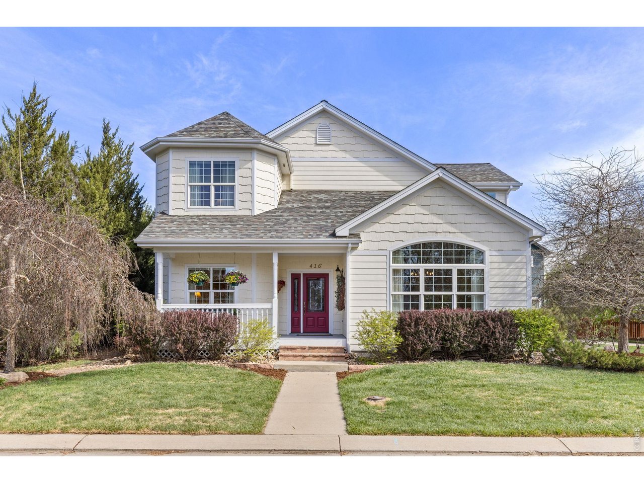 Situated in Quail Ridge, one of Longmont's most charming neighborhoods, this beautifully cared-for home offers warmth, character, and everyday livability on one of the community's larger lots. With three bedrooms, four bathrooms, a welcoming front porch, mature landscaping, a hawthorn tree, south-facing orientation, and a side-load garage, the home makes a strong first impression. Professionally designed landscaping features Japanese lilac bushes, barberry, a birch tree, and upright junipers for added privacy. Inside, a gracious foyer opens to an elegant sitting room and formal dining area. The kitchen is the heart of the home, showcasing maple cabinetry, granite countertops, a Venetian plaster counter, a Thermador gas range, and stainless-steel appliances. A sunny breakfast nook flows into the cozy hearth room with fireplace and sliding doors to a private patio-ideal for everyday living and entertaining. The main level also includes a three-quarter bath and a bright laundry room. The finished garage offers epoxy floors, insulation, fresh paint, and built-in cabinetry. Upstairs features an office, along with two bedrooms that share a Jack-and-Jill bath. The spacious primary suite features large windows, a walk-in closet, and a five-piece bath. The basement is 90% finished, offering a large family or TV room, recessed lighting, egress windows, a three-quarter bath, and ample storage. Impeccably maintained and full of charm, this home is located near the Longmont Museum, Recreation Center, Innovation Center, and local shops and dining. Welcome home.