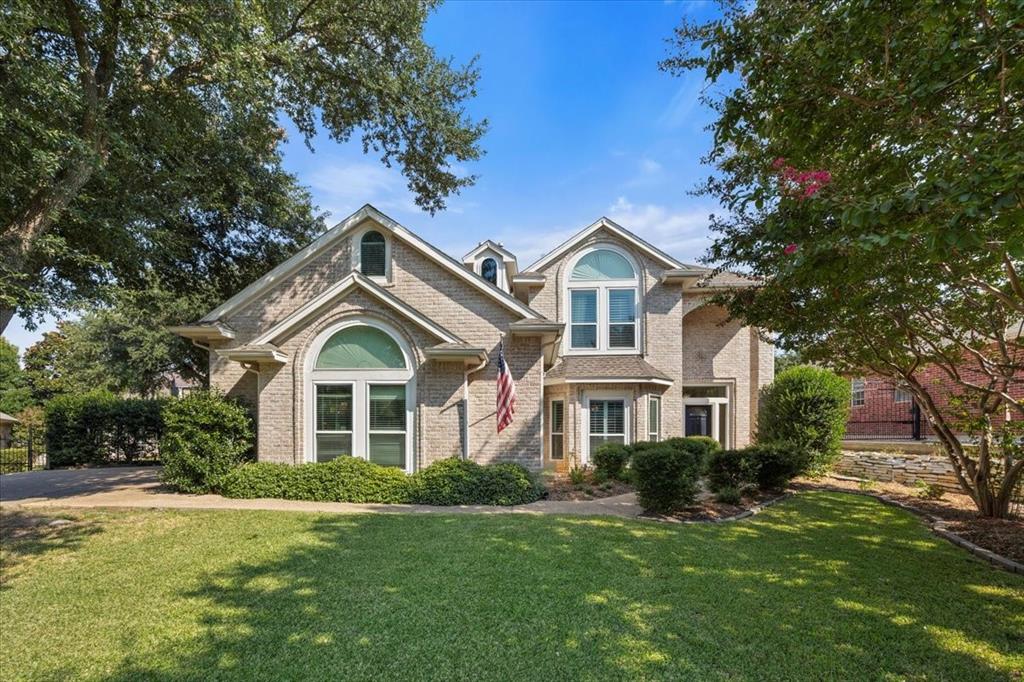 Elegant traditional home in the gated community of Vista Ridge instantly feels like home! Spacious yet inviting, it offers 4 bedrooms, 2.5 baths, and a layout designed for both comfort and connection. Updates include new windows, gutters, interior paint, and upstairs carpet, plus the conversion of the fireplace to gas with gas logs, new mantle, reinforced fireplace bricks, and rebuilt chimney cap. Additionally, the water main was replaced and retrenched in Summer 2024. The first floor, flooded with natural light, includes an expansive living area, formal dining, eat-in kitchen, large laundry room and convenient powder bath. Upstairs features a flexible second living room, primary ensuite, secondary bedrooms and secondary full bath. The primary suite boasts wood floors, huge windows, and french doors leading to the deck. The backyard is a private retreat built for entertaining, featuring a fenced-in pool and covered patio with built-in grill. Just minutes from downtown and convenient to Mira Vista Country Club, with nearby access to schools including Trinity Valley, SW Christian, and Crowley ISD, this home is your opportunity to enjoy both community and convenience.