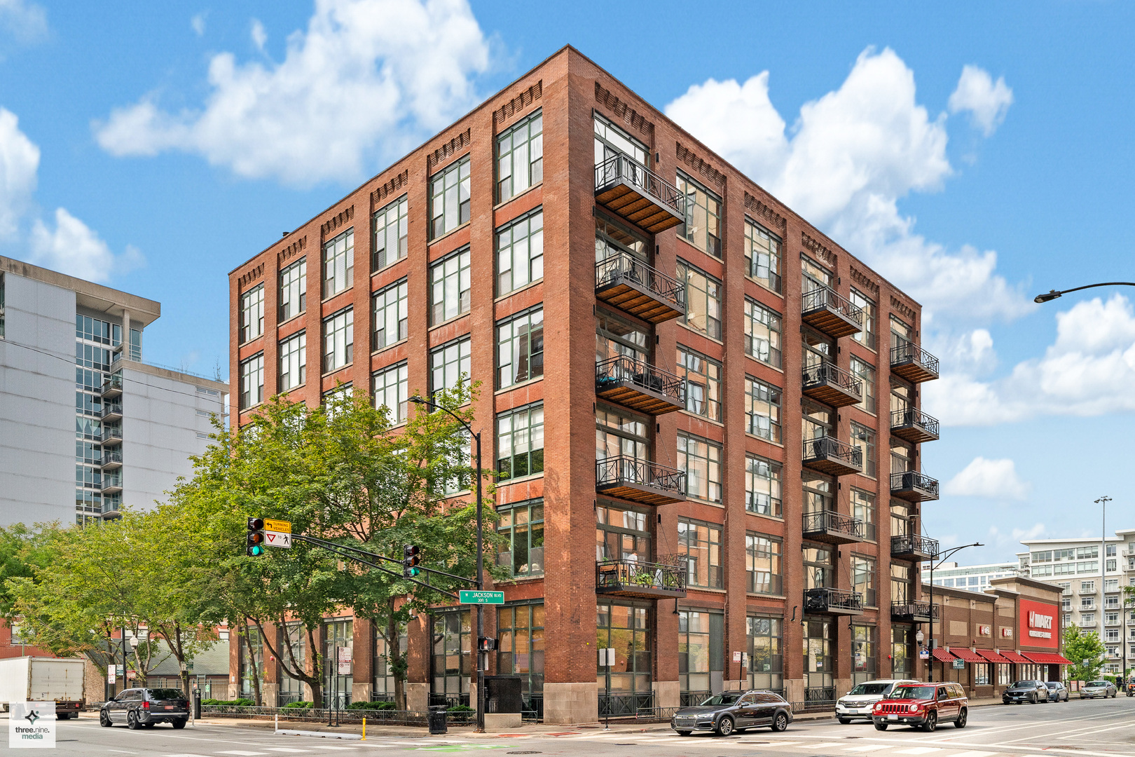 Step into this stylish 2-bedroom, 2-bath timber loft perfectly positioned at the crossroads of West Loop, Greektown, and the Financial District. This intimate loft residence showcases soaring 12-foot exposed timber ceilings, an airy open-concept layout, and an updated kitchen highlighted by white shaker cabinetry, stainless steel appliances and Quartz countertop. The unit has been freshly painted and features oak hardwood floors throughout. A spacious living area provides plenty of room for both a full dining setup and a lounge or entertainment zone, while a northeast-facing balcony extends your living space outdoors. Each bedroom offers its own private bath, and the convenience of in-unit laundry is included. Want more space for entertaining? The shared rooftop deck, just steps away, is the perfect spot to enjoy the sunset. Assessments cover water, cable, and internet, with rental parking options close by. All of this is just steps from the Blue Line, popular restaurants, fitness centers, and everyday shopping.