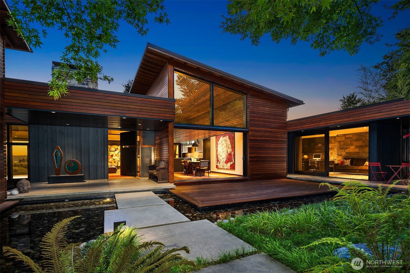 AIA Award-Winning Modern Masterpiece in the Heart of Clyde Hill Designed by renowned architect Rex Hohlbein and brought to life by ESMB Construction, this iconic residence is more than a home, it's a living work of art. Nestled off a quiet street in coveted Clyde Hill with stunning skyline and Olympic Mountain views, this one-of-a-kind sanctuary offers exceptional craftsmanship, curated materials, sleek modern finishes and seamless indoor-outdoor living with soaring ceilings and walls of sliding windows. Whether you're entertaining in style or enjoying the tranquility of ultimate privacy in your own retreat, every inch of this home has been intentionally designed with luxury, functionality, and architectural brilliance in mind.