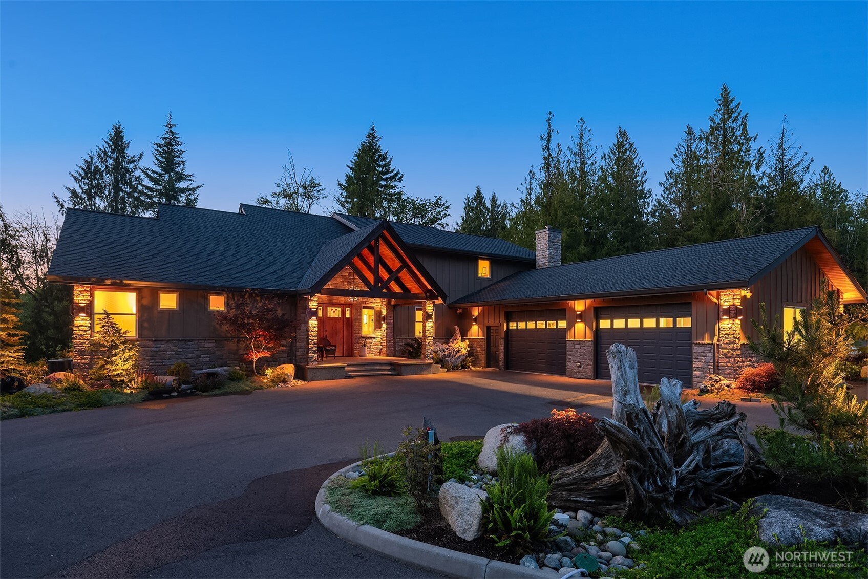 Welcome to Onalaska River Ranch, a fully reimagined country estate on nearly 10 fenced and cross-fenced acres along the South Fork of the Newaukum River. Completed in 2023, the home was rebuilt from the studs, with everything new except the attached oversized two-bay garage. Enjoy new siding, windows, roof, plumbing, electrical, kitchen, bathrooms, flooring, appliances, and finishes throughout. This immaculate and stunning home is essentially brand-new and ready for your immediate enjoyment without any deferred maintenance.     The outdoor living is exceptional, featuring 1,262 square feet of riverfront patio, most of it covered, with a wood-burning fireplace and gas starter for year-round enjoyment. The property features three additional structures, and a greenhouse with concrete raised beds. First, built in 2020, an impressive 40x60 shop includes a sport court and solar PV that generates summer energy credits. Next, a heated and air-conditioned barndominium offers flexible living with a full kitchen, full bath, laundry, a spacious upstairs sleeping area, and room for at least 4 collectors’ vehicles among other possibilities.     Equestrians will appreciate the barn with one finished horse stall, room for five more stalls, water and power at every stall, plus tack room, hay and equipment storage. A gated entrance and fully paved asphalt driveway complete this private riverfront estate, designed for recreation, horses, hobbies, and luxurious yet comfortable everyday living.