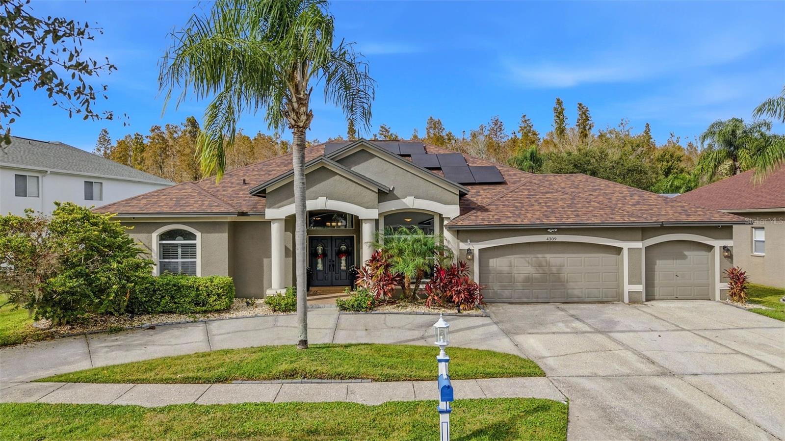 Under contract-accepting backup offers. THIS IS THE ONE YOU'VE BEEN WAITING FOR — A stunning 4-bedroom + office, 3-bath, 3-car garage POOL HOME featuring a rare CIRCULAR DRIVEWAY on a CONSERVATION LOT, located in the highly sought-after golf community of HERITAGE HARBOR, known for its exceptional amenities and access to some of the TOP-RATED SCHOOLS in Hillsborough County. Includes a fully-OWNED NET ZERO SOLAR ENERGY system designed to offset the home's entire electrical usage, resulting in little to no monthly electric bill —an incredible long-term benefit rarely found in homes of this caliber. Filled with natural light, this beautifully designed SINGLE-STORY HOME showcases gorgeous high ceilings, custom wall trim, and built-ins throughout, adding a beautifully crafted, custom touch. The updated kitchen is both elegant and functional, featuring quartz countertops, rich walnut cabinetry, abundant storage, a large island, a breakfast nook, and motorized shades in the kitchen and great room for enhanced comfort and ease.The thoughtfully designed layout includes spacious bedrooms, a dedicated home office, and built-in storage in the garage, pantry/laundry room, and entryway, providing exceptional organization throughout the home. Step outside to an extra-large backyard that backs up to conservation with NO REAR NEIGHBORS, offering privacy and serene views. The concrete pool and outdoor entertaining area create the perfect setting for relaxing or hosting guests while enjoying true Florida living.The primary suite is a peaceful retreat with a large walk-in closet and a spa-like owner’s en suite bathroom featuring a soaking tub and oversized walk-in shower. Bedrooms two and three share a Jack-and-Jill bathroom with double vanities, while the fourth bedroom is privately tucked toward the back of the home with the third full bath, ideal for guests or multigenerational living.Heritage Harbor elevates this home even further with its premier, resort-style amenities—including an 18-hole championship golf course, a beautiful Gulf-Coast–inspired clubhouse, a resort pool with a three-story water slide, lap lanes, a splash zone, tennis and basketball courts, playgrounds, and a fitness center. The community is known for its vibrant social atmosphere, family-friendly environment, and year-round events, all while offering easy access to nearby shopping and dining, and zoning for top-rated schools such as McKitrick Elementary, Martinez Middle, and Steinbrenner High.Located in the heart of Lutz, this address offers unbeatable convenience—just minutes from the Veterans Expressway, Dale Mabry Highway, SR-54, and quick connections to I-75 and I-275, making commutes throughout Tampa Bay effortless. You’re only 20–30 minutes from Tampa International Airport, Downtown Tampa, the Tampa Riverwalk, and the causeways leading to Florida’s world-famous Gulf beaches. This prime location also puts you close to fantastic dining, shopping, and entertainment options, including the Tampa Premium Outlets, Wiregrass Mall, and the vibrant mix of local businesses throughout Lutz and Wesley Chapel. Major medical centers such as AdventHealth and BayCare are just a short drive away, along with popular Florida attractions like the Epperson and Mirada Lagoons, nature preserves, breweries, and golf courses.A rare opportunity to own a move-in-ready pool home with conservation views in one of Hillsborough County’s most desirable communities. Schedule your private tour today!