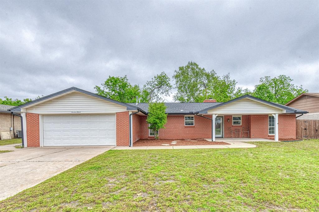 Check out this charming, move in ready 3-bedroom home located on a nice-sized lot in Westland, walking distance from the sought-after Monroe Elementary School! The large, covered front porch provides a great space for sitting outdoors and socializing with neighbors! A large open flower bed sits waiting for you to add your own curb appeal to the home! Inside, step into the open living/dining space adorned with wood flooring, a wood burning fireplace surrounded in a brick hearth with floating shelves, and unique ceiling fan for cooling! The kitchen comes with updated built-in appliances, tile backsplashes, granite counters, and painted cabinets with an ample number of easy-glide drawers! The primary suite offers a large vanity and a tiled stand-up shower. All bedrooms come with 2 closets for added storage. Both bathrooms come with hand bars in the shower stalls for added support. Outside, you have a large open concrete patio with a big yard. Use this space to create your own back yard oasis! Located within quick proximity shopping and dining, Highway 9, and OU campus! Don't miss out on this hidden gem!