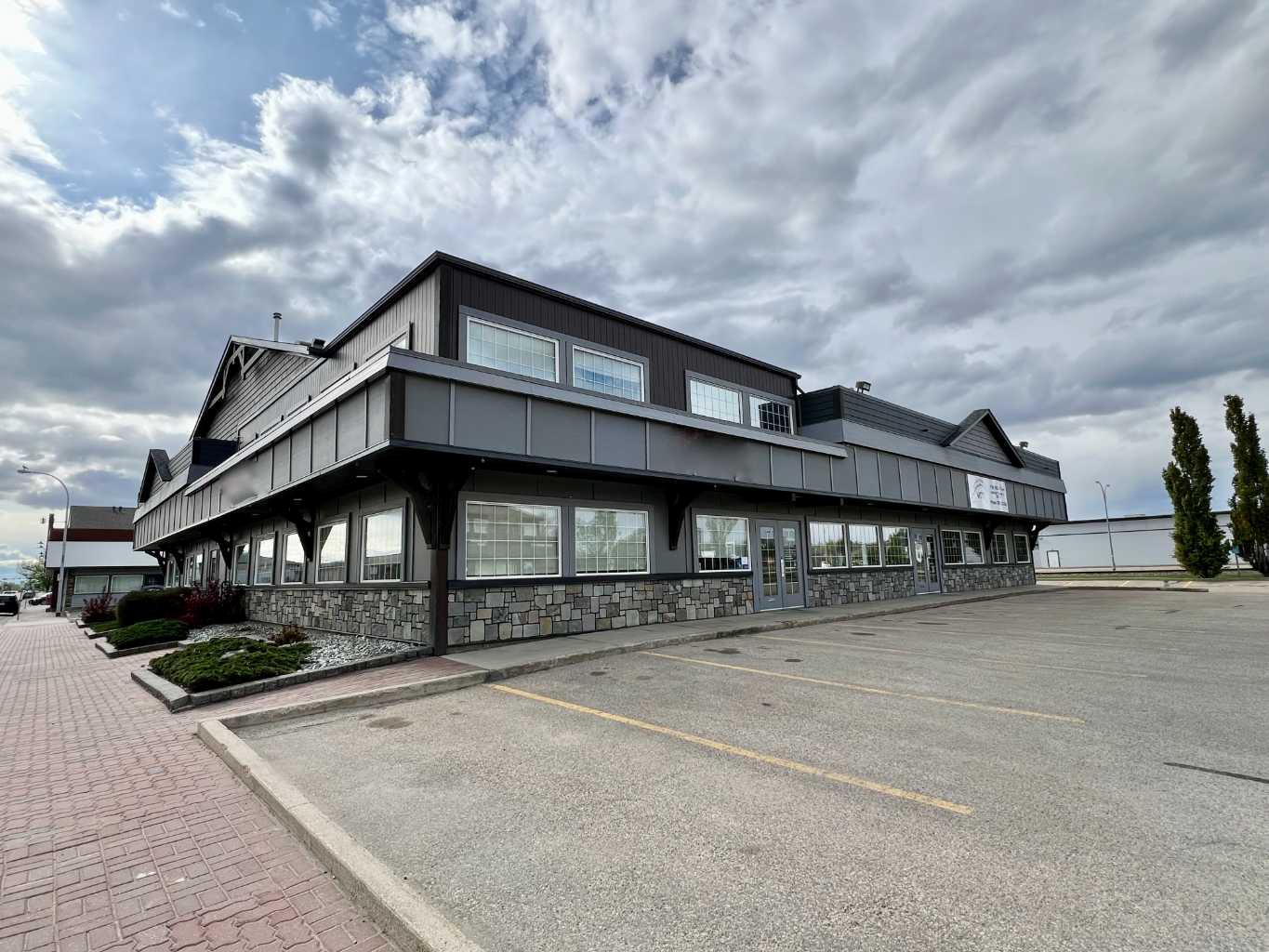Occupancy/vacant possession available NOW!! Part or all of the space is available for lease or for sale.  Fantastic office space in central location with ample parking and recent renovations!! office space in central commercial district of Grande Prairie. Beautiful Station 98 building has had an extensive exterior renovation completed. There are two main entrances to this large office/professional space - one staff entrance on the West Side of the building and one client entrance on East side of the building, with an abundance of parking for both! These units could be divided into 2,3 OR 4 separate main floor and upper units if needed. This would be an excellent space for accounting, legal, engineering, etc.