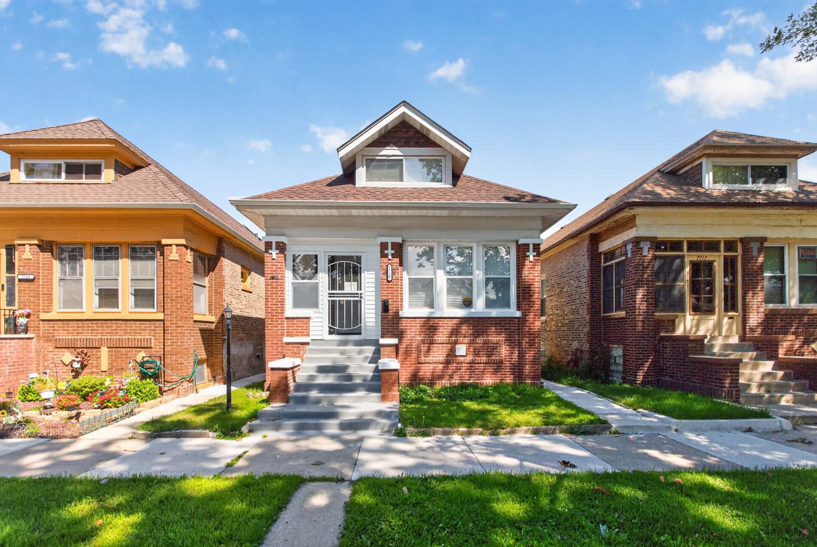 ICONIC CHICAGO BRICK BUNGALOW WITH ALL THE BELLS AND WHISTLES. COME AND VIEW THIS 5 BEDROOM AND 3 FULL BATH  HOME! GORGEOUS HARDWOOD FLOORS ON FIRST LEVEL, PORCELAIN FLOORS ADORN THE SPACIOUS KITCHEN WITH ISLAND AND HIGH-END STAINLESS STEEL APPLIANCES INCLUDING REFRIGERATOR, OVEN RANGE AND DISHWASHER. ENCLOSED REAR PORCH WITH ENGINEERED WOOD LAMINATE FLOORING! MAGNIFICENT PRIMARY SUITE BATH ON SECOND LEVEL WITH DOUBLE VANITY SINK AND LUXURIOUS BATH! COMPLETELY FINISHED BASEMENT WITH PORCELAIN TILE THROUGHOUT AND MARVELOUS WALK- IN SHOWER. TWO ADDITIONAL SPACIOUS BEDROOMS AND LAUNDRY ROOM. TWO-CAR GARAGE IN REAR. NEW SECURED CENTRAL AIR AND FURNACE.
