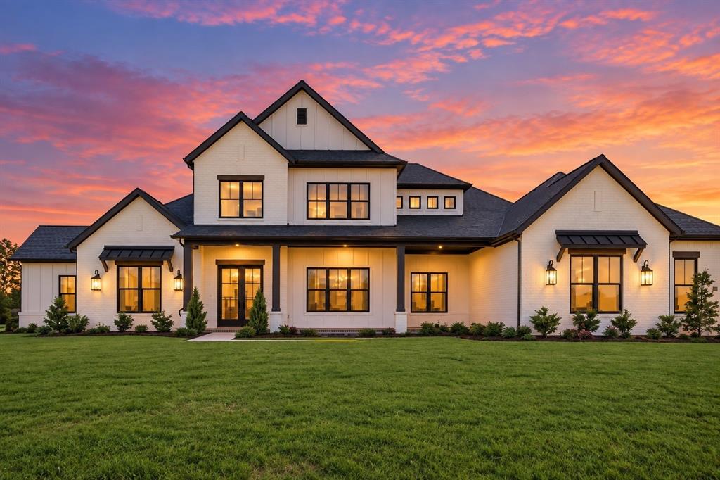 New construction by J. Anthony Custom Homes on a one-acre corner homesite in Fairview, located within an intimate community of 12 custom residences. A side-entry four-car garage, manicured landscaping, and striking architecture introduce a thoughtfully designed home with soaring ceilings, wood flooring, designer lighting, and an open-concept floor plan. The two-story foyer features custom wall paneling and a statement chandelier, while the main living area is anchored by a floor-to-ceiling wood-paneled fireplace and expansive sliding glass doors opening to the backyard. The kitchen is designed with Taj Mahal quartzite countertops, an oversized waterfall island with storage, custom cabinetry, Thermador appliances, built-in refrigerator, pot filler, and dedicated coffee bar. A separate prep kitchen offers additional appliances, pantry storage, and a convenient grocery pass-through for unloading directly into the space. A wet bar with wine refrigerator provides an additional entertaining area. The main level also includes a private study, multigenerational suite, additional bedroom, and flexible spaces designed around the way you live. A flex room offers direct backyard access, while a dedicated fitness room with rubber flooring provides space for an at-home gym. The primary suite features vaulted ceilings and direct access to the backyard. The spa-inspired bath includes dual vanities, a soaking tub, and a frameless glass-enclosed shower with multiple showerheads. A walk-in closet with custom built-ins includes a hidden safe room concealed behind a mirror. Upstairs, two additional bedrooms accompany a spacious game room with a built-in tech bar and access to a balcony. A Texas basement provides space for storage or future expansion. Outside, the covered patio extends the living space into the expansive backyard, where a custom pool is nearing completion. Direct access to a dedicated pool bath adds convenience for outdoor entertaining. Easy access to Highway 121.