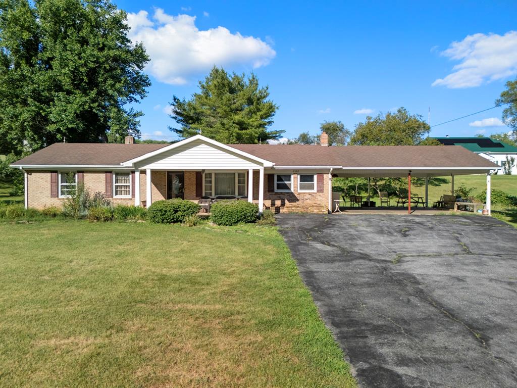 If you've been looking for a well-kept home with plenty of outdoor space, 4182 Cedar Springs Rd is worth a look. Situated on a level, cleared lot, the property offers multiple outbuildings and a large carport, giving you plenty of room for storage, gardening, hobbies, or entertaining family and friends. Inside, you'll find beautiful hardwood floors that have been well cared for over the years. The cozy den features a fireplace and is the perfect spot to unwind, while the spacious kitchen offers solid birch cabinets, stainless steel appliances, and plenty of cabinet and counter space for everyday living. The home includes 3 bedrooms and 1 full bath, making it a great fit for a variety of buyers. Downstairs, the full basement provides endless possibilities. Whether you need extra storage now or want to finish it into a recreation room, workshop, home gym, or additional living space, you'll have plenty of room to make it your own. With a great yard, functional layout, and space both inside and out, this home offers the opportunity to enjoy peaceful country living while still being convenient to everything you need.