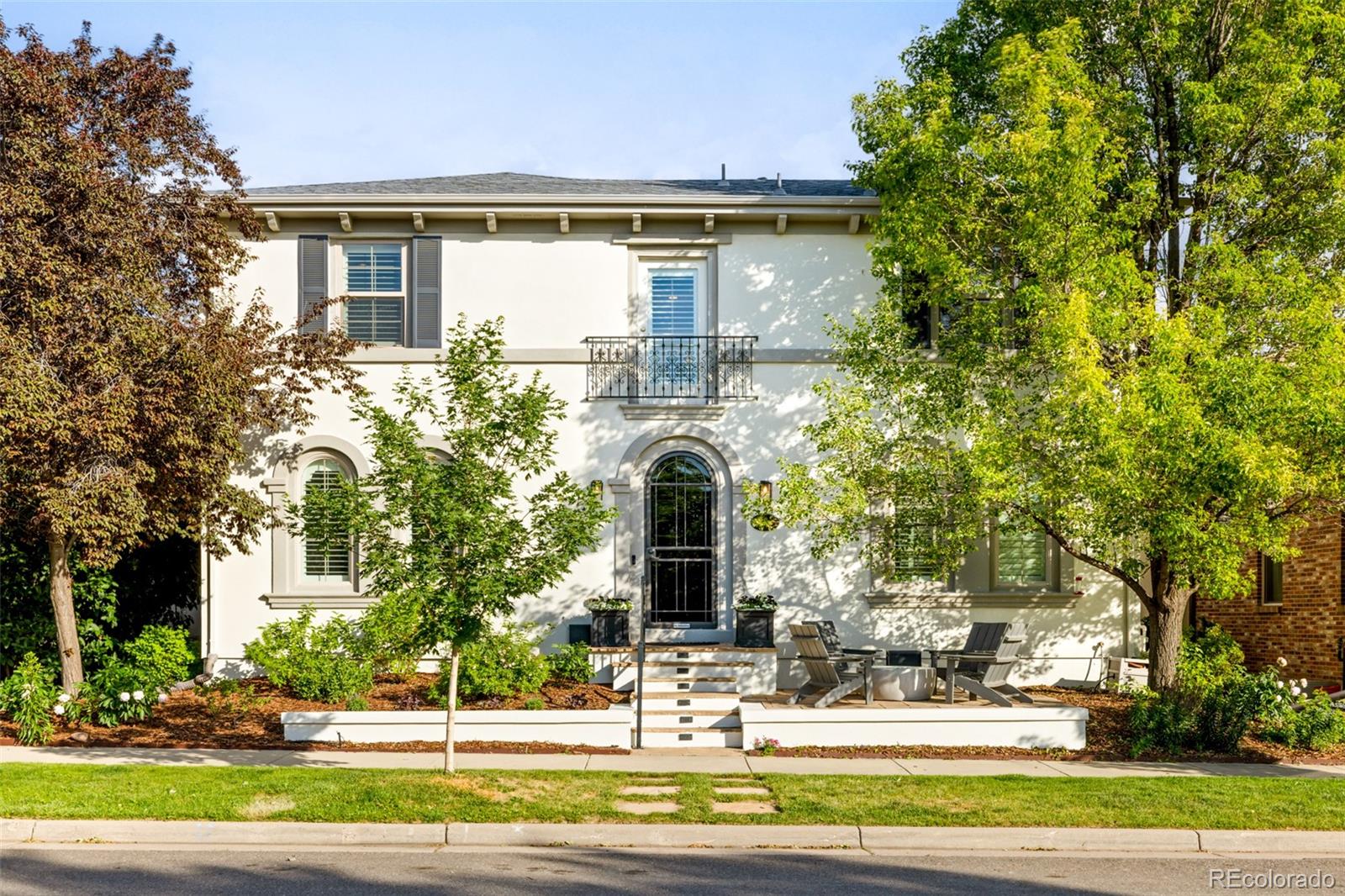 Positioned on a quiet park in the Eastbridge community of Central Park, this exceptional residence delivers a rare combination of elevated design and effortless livability. Sweeping mountain views grace the front of the home, while three distinct outdoor living spaces — including a Juliet door off the primary suite — create a seamless connection to the scenery. The interiors have been updated top to bottom with curated neutral finishes, beginning with a sunlit office, elegant dining room with classic shutters and a butler's pantry complete with a full-size freezer and pantry with pull-out shelving. The chef's kitchen anchors the home with a large center island and a bright breakfast nook. The great room impresses with two-story ceilings, a fireplace and custom built-ins. The primary suite offers a serene bath with a soaking tub and walk-in shower. Below, a finished basement balances adventure and comfort — featuring a climbing wall alongside a cozy fireplace. Outside, a pergola, deck and outdoor fireplace complete this extraordinary offering. Ideally situated in the heart of Eastbridge, this home offers an exceptional lifestyle just moments from Eastbridge Town Center, the Stanley Marketplace and the Central Park rec center . While miles of walking and biking trails weave throughout the neighborhood, connecting parks, open space, and some of Central Park's most beloved destinations.