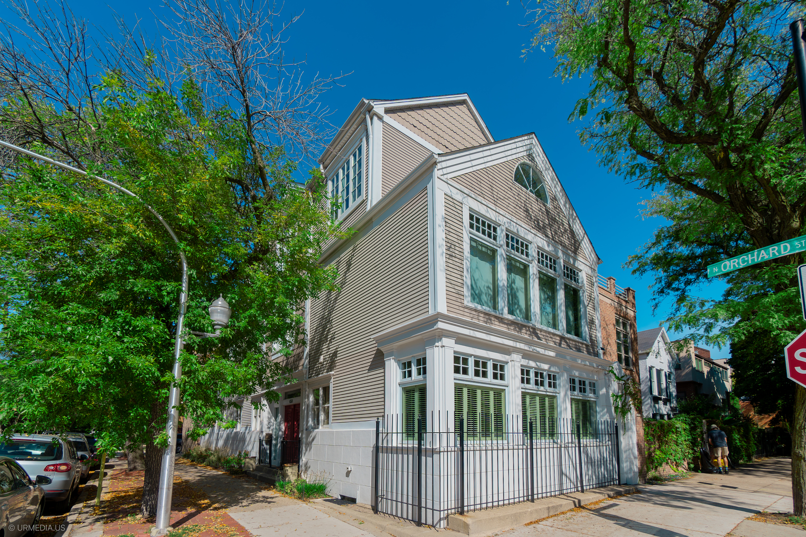 Originally built in 1880 and beautifully reimagined for modern living, 658 W Willow Street is a stunning single-family home in the heart of Lincoln Park - blending timeless character, sophisticated updates, and the rare bonus of an income-producing, fully renovated coach house with its own rooftop deck.    Perfectly situated on a picturesque tree-lined block just steps from Armitage Avenue's vibrant shops and restaurants, this four-bedroom, four-and-a-half-bath Victorian residence offers the best of historic charm and designer-curated luxury.    Step inside and be greeted by a gracious foyer that sets the tone for what's to come. The sunlit living room, anchored by an elegant slate fireplace, invites cozy evenings and lively gatherings alike. Flow seamlessly into the spacious dining area and the spectacular chef's kitchen - a culinary showpiece with custom cabinetry and finishes thoughtfully selected by a professional interior designer.    Upstairs, the serene primary suite is your private retreat, featuring its own fireplace, spa-inspired bath, Juliet-balcony overlooking the courtyard, and an expansive dressing room. A second ensuite bedroom and convenient laundry room add comfort and ease. The top floor offers two more generous bedrooms, an updated full bath, and a flexible lounge perfect for a playroom, media room, or guest space. A partially finished basement provides additional room for recreation, a home gym, and ample storage.    Beyond the main residence, discover your fully updated coach house - a hidden gem ready to generate significant income or serve as the ultimate guest quarters. With its own private entrance, sunny living area, bedroom, kitchenette, and private rooftop deck, it's perfect for hosting friends and family or capturing lucrative short-term or long-term rental income. For years, the coach house has been operated as one of Chicago's highest-rated guest stays - an Airbnb "Guest Favorite" with consistent 5-star reviews and steady demand - generating over $6,000/month in additional income, all in complete privacy.    Enjoy Chicago's best seasons from your secluded backyard oasis, complete with a spacious patio for outdoor dining and entertaining. A two-car garage and extra storage complete the picture of practical luxury.    Nestled within the Lincoln Elementary School District, you're moments from Oz Park, the lakefront, the Armitage El stop, and some of Chicago's most beloved restaurants, boutiques, and neighborhood gems. Here, the best of historic Lincoln Park meets flexible modern living - with room to grow and the freedom to let your home work for you.    Don't miss this rare opportunity to own a timeless Lincoln Park treasure with the lifestyle, location, and income potential that make city living truly extraordinary.