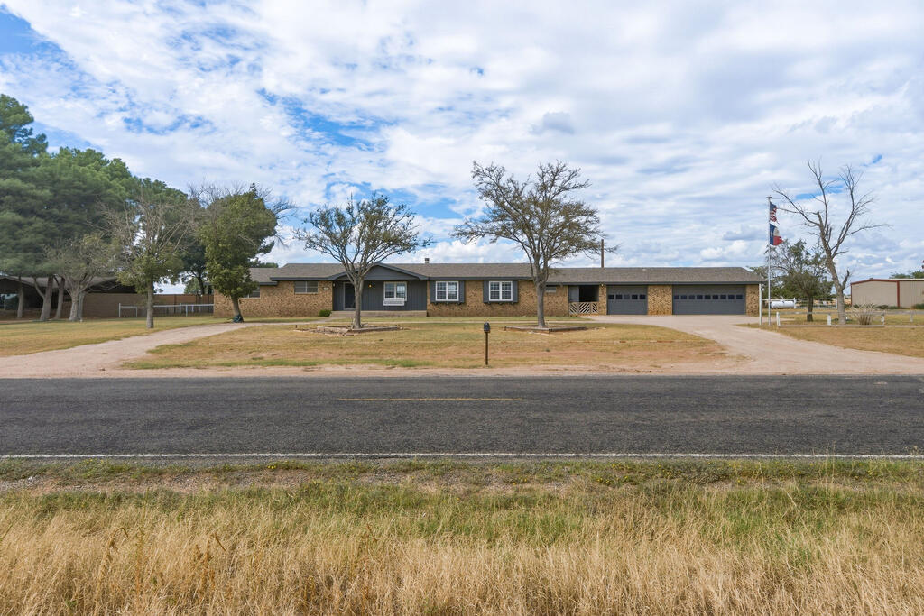 CHARMING 5-BEDROOM, 2-BATH HOME ON TWO ACRES NEAR GREENWOOD NEW ELEMENTARY AND INTERMEDIATE SCHOOLS! THIS 2,327 SQ FT PROPERTY OFFERS A SECLUDED PRIMARY SUITE WITH A LARGE WALK-IN CLOSET AND A SPACIOUS, FUNCTIONAL LAYOUT. ENJOY THE NEWLY SODDED BACKYARD, NEW PIPE FENCING, AND APPROX 20 GPM WATER WELL,  THE PROPERTY ALSO FEATURES A NICE SHOP AND A 3-CAR GARAGE, PROVIDING EXCEPTIONAL SPACE FOR STORAGE, PROJECTS, OR WORK. THIS WELL-LOCATED PROPERTY OFFERS SPACE, CHARM, AND PLENTY OF POTENTIAL AND 4H ANIMALS! RECENT UPDATES: INTERIOR NEW PAINT THROUGHOUT AND NEW CARPET, GISD, A MUST SEE!