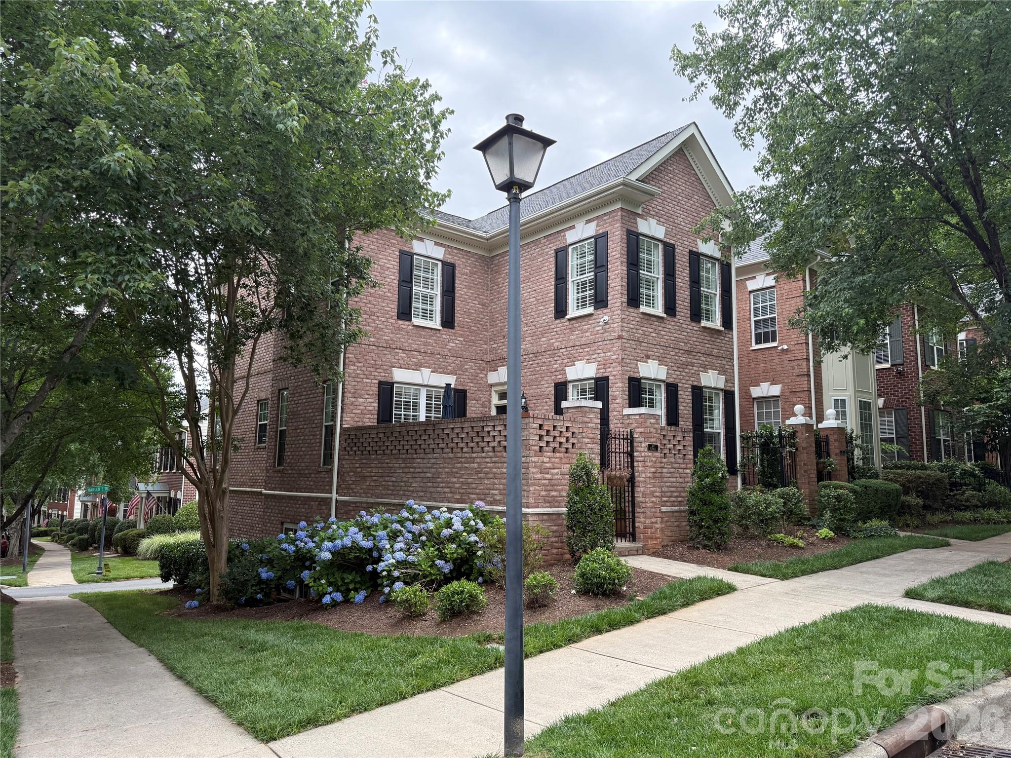 Headline: Stunning End-Unit Townhouse in Highly Desired St. Albans!Welcome home to one of the largest townhouses in the sought-after St. Albans neighborhood! This beautiful end-unit is flooded with incredible natural light and greets you with a charming courtyard entrance. Step inside to find an inviting open floor plan featuring gorgeous hardwood floors throughout and a true chef’s kitchen—perfect for entertaining.The spacious primary suite features a beautifully renovated bathroom (2024). Major system upgrades offer complete peace of mind, including a new HVAC system (2025) and a new Rinnai tankless water heater (2026).Enjoy the perfect blend of a quiet, peaceful neighborhood setting with unbeatable convenience. You are just one mile—an easy, scenic walk—from Historic Downtown Davidson, packed with local boutiques, award-winning restaurants, and the famous weekend farmers market. Don't miss this rare opportunity!Convenient to Lake Norman, Uptown Charlotte and Charlotte-Douglas International Airport.Unit is designed to be elevator ready!