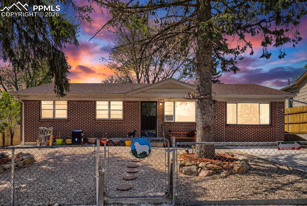This charming ranch-style home offers a flexible layout and inviting spaces ready for your personal touch, an excellent opportunity for buyers looking to get into homeownership or create value over time. Featuring 3 bedrooms and 1 full bath, the home welcomes you with an open-concept living, dining, and kitchen area, ideal for gathering, sharing meals, and creating meaningful everyday moments. The spacious primary bedroom is located on the opposite side of the home from the additional two bedrooms, offering added privacy and flexibility. Step outside to enjoy a fully fenced front and backyard, perfect for relaxing, pets, or spending time with loved ones. The covered and enclosed patio extends your living space and offers a great spot for year-round enjoyment, whether hosting, unwinding, or simply being together. A storage shed adds extra convenience for tools and equipment. Situated in an established neighborhood with mature trees and a peaceful feel, this home is ideally located near parks, District 11 schools, shopping, and transportation. With no HOA and plenty of opportunity to make it your own, this property is a smart option for those seeking space, flexibility, and a place to truly feel at home.