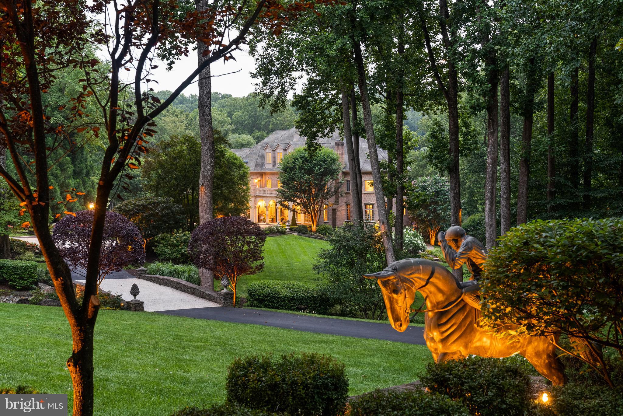 Come and see for yourself! OPEN this Sunday 2-4!!!!THE ESTATE AT MINE RUN:Nestled in  the blissful hills surrounding Great Falls Park is a masterpiece of old-world craftsmanship and modern appointments. Encompassing approximately 5.44 acres of secured land; this estate affords a unique combination of privacy and accessibility.  Passing through the stately front gates is a breathtaking tree canopied sweeping driveway which culminates at the main residence with its commanding motor court and majestic fountain. The spectacular grounds feature lush specimen plantings, stunning hardscape, antique sculptures, Haddonstone garden gazebo, fountains and so much more!  The handsome facade showcases lovely arches and ornate precast columns. Step into the breathtaking foyer, where your greeted by stunning Swarovski crystal chandeliers in every room, with gleaming marble floors and soaring ceilings setting a tone of timeless grandeur. Stunning plaster moldings with gold appointments and bespoke millwork flow from the foyer seamlessly into the living, dining and great room creating an elegant continuity throughout.  The formal living room-bathed in natural light from Palladian windows overlooking the lush grounds exudes warmth and sophistication.  French doors open to the music room and conservatory/sunroom, ensuring effortless flow for both grand entertaining and intimate gatherings. The library features lovely hardwood floors with inlay  cherry borders, custom built-in cabinetry and custom shutters.  A spectacular gourmet kitchen- well appointed with crystal chandeliers, Viking range, Sub Zero and extra large kitchen islands with intricate millwork, custom cabinets and countertops,  wine/beverage refrigerators, specialty tile backsplash, generous breakfast room with fireplace and floor to ceiling windows and french doors opening to the terrace.  Primary Suite - is a sanctuary of refinement featuring 23 carat  gold leaf ceilings, angled hardwood floors, tray ceilings and a sitting room warmed by a glass-enclosed fireplace all overlooking the stunning grounds. Crystal sconces and detailed plaster moldings accentuate soaring ceilings, blending grandeur with intimacy. Primary Bath- spa-inspired retreat with 20 “  marble floors, marble vanities adorned with Mother-of-Pearl inlays and  intricate gold inlay  and imported Italian tile with custom solid brass fixtures. Indulge in a spa shower with body sprays or unwind in the tub - an indulgent oasis of relaxationThe walk-out lower level crafted for unforgettable gatherings features a billiards area with custom sconces and recessed lighting, a top of the line golf simulator, fireplace and a state-of-the-art theater with paneled walls and a home gym/work out room.   A full kitchen with granite counters and large breakfast bar ensures seamless hosting. A spacious recreation room with expansive windows and a playroom/bedroom with a full bath offer versatility.  Large floor to ceiling  custom doors walkout to covered terraces which are all framed by scenic views.  Tucked discreetly on the estate’s grounds is a fully appointed guest cottage offering a private retreat for guests, staff or security detail. Featuring 2 BRs, 2 BAs, hardwood floors, 2 cozy fireplaces, a full kitchen, covered screened porch and an extensive climate controlled wine cellar;  providing independent comfort and privacy. Fully fenced compound, Luscious gardens, terraces, deck, fountains. granite block paver motor court, generators for both homes, state-of-the-art security, irrigation system  complete this amazing offering.  Equestrian in the family? Many facilities in the area! (See map in documents) All within 25 minutes of Dulles & Reagan National airports - Langley High School pyramid-Registration form needs to be provided with showing request.  Thank you! Must watch video-https://youtu.be/ulEHmGRrcbA?si=yraOjq8WQBUVlzi7