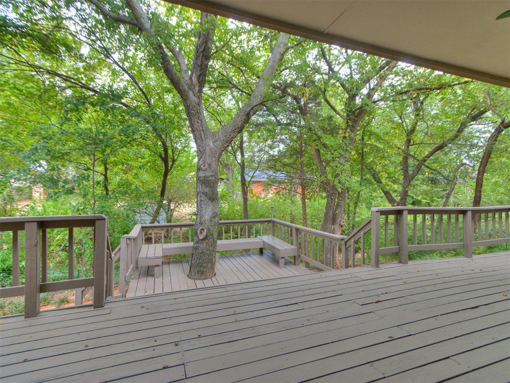 Welcome home to 1819 Chelsea Drive, a beautifully updated residence nestled in the desirable Chelsea Station neighborhood located in the heart of Edmond. This home is situated on a beautifully wooded lot on a quiet street just mins from Broadway. It offers an ideal blend of comfort, style & convenience.  

This home provides 4 bedrooms + 3 full baths of thoughtfully designed space with an open concept living & entertaining area anchored by a gas fireplace (mounted TV stays), high ceilings & a beautiful view of the wooded backyard.  The spacious kitchen, featuring freshly painted cabinetry, granite countertops, stainless steel appliances (all stay, including washer/dryer) & a gas range with built-in microwave, creates the perfect meal prep space whether cooking for one or entertaining many.

Primary suite, located downstairs, includes remodeled bath with quartz countertops, dual sinks, whirlpool tub, large shower & spacious walk-in closet.  Secondary bedrooms, located on the main floor, offer easy access to an updated full bath w/dual sinks & shower/bath combo.  Upstairs, discover an expansive bonus space w/ a large walk-in closet & full bath—an ideal space to use as a media room, play space or guest suite. Options are endless! 

If outdoor living is what you are looking for, this home has it! Imagine yourself on this beautiful wood deck overlooking mature trees and a tranquil creek area while partaking in a morning cup of coffee or enjoying an evening of roasting marshmallows with friends.  It truly is country living in the middle of town.  

This home offers a seamless blend of everyday livability & entertaining functionality. Its well-planned spaces offering flexible use, updated finishes & outdoor living, adapt easily to individual needs. Located in the desirable Edmond school district w/easy access to UCO, shopping, dining & major thoroughfares, this home captures the best of suburban living amenities. Don't wait...schedule your showing today!