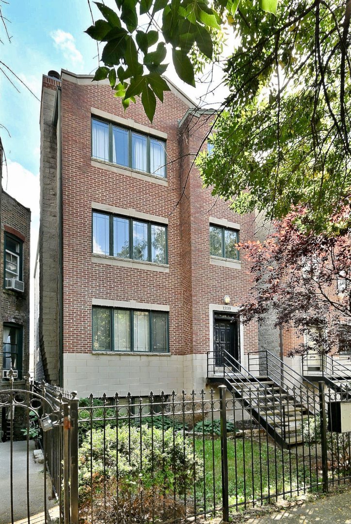 BUILT IN 1999. THIS METICOULOUSLY MAINTAINED 2 BED 2 BATH EXTRA WIDE CONDO IS LOCATED AT THE  EDGE OF THE SOUGHT AFTER WICKER PARK AREA. THE CRAFTMANSHIP IS UNIQUE AND STYLISH AND ONE OF KIND WHEN COMPARED TO OTHER UNITS IN THE AREA. FROM ITS WOOD BURNING FIREPLACE WITH ITS GAS STARTER, ITS CUSTOM HW FLOORS AND AN OPEN CONCEPT DESIGN THAT FEATURES A BEAUTIFUL GOURMET KITCHEN WITH ALL ITS BELLS AND WHISTLES. THIS UNIT WILL LEAVE YOU FEELING LIKE YOU HAVE FINALLY FOUND YOUR DREAM HOME. IT FEATURES VERY GENEROUS BEDROOM SIZES THAT CAN FIT A KING SIZE BED AND FULL BEDROOM FURNITURE. BOTH FULL BATHS ARE UPDATED WITH CERAMIC TILES AND NEW VANITIES. THE MASTER BEDROOM IS ADJACENT TO ITS SUNNY AND WELL SIZED DECK FOR YOUR 3 SEASONS OF ENJOYMENT. THE FRONT WINDOWS HAVE BOTH SHADE AND SUNLIGHT COMING THROUGH ON THIS QUIET TREE LINED RESIDENTIAL STREET. FRESHLY PAINTED WITH MANY NEW MECHANICALS AND RECENT UPDATES WHICH INCLUDE NEW HVAC UNIT, NEW FURNACE, NEW WATER HEATER, NEW MICROWAVE, NEW WASHER DRYER, NEW SINK FAUCETS, NEW BATHROOM VANITIES, NEW LAVATORY, NEW WASHER HEADS FOR TUBS, NEW FRONT WINDOW FRAMES AND HARDWARE, NEW FRONT GATE LOCKS AND ELECTRIC TRIGGER, NEW ROLLER AND GATE MOTOR EXTERIOR, COMPLETE WATER SEALANT OF EXTERIOR OF BUILDING. MORE  CAN BE FOUND IN THE ADDITIONAL INFORMATION TAB, SO MUCH TOO LIST. PLEASE DO NOT FORGET TO VIEW THE VIDEO WALK THROUGH OF THIS AMAZING UNIT. LOCATED WITH EASY ACCESS TO UKRAINIAN VILLAGE, BUCKTOWN, LOGAN SQUARE AND HUMBOLDT PARK. WALKING DISTANCE TO SHOPS RESTAURANTS, NEAR ARTESIAN PARK, CAMPBELL GARDEN AND EL YUNQUE COMMUNITY GARDEN. BLUE LINES, 90/94 AND BUSES ON WESTERN/DIVISION AND NORTH AVE ARE ALL IN WALKING DISTANCE. MAKE YOUR APPOINTMENT TODAY WILL NOT LAST LONG.