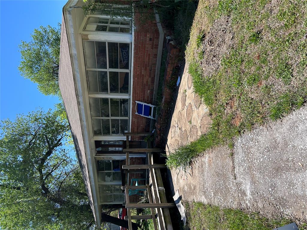 Investor special with incredible potential! This property sits on 1.37 fully fenced acres and was previously configured as a 4-bedroom, 2-bath home. The interior has been taken down to the studs, offering a blank canvas for your vision and renovation plans. Beautiful wood floors remain, providing a great starting point to restore its charm. With add-ons/room additions, total square footage is approximately 2100 sf.  With ample space and endless possibilities, this property is ideal for investors, flippers, or anyone looking to create their dream home from the ground up.  Property is being sold in "as-is" condition.  Cash offers only.